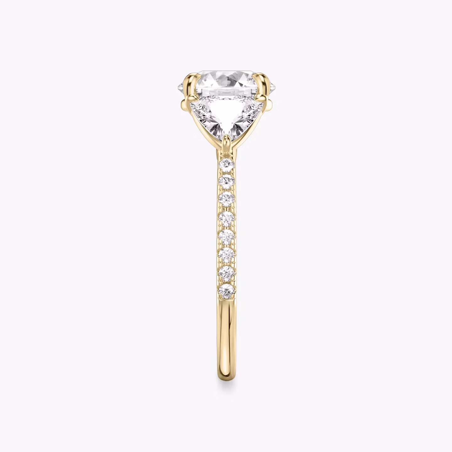 The Three Stone | Round Brilliant | 18k | Yellow Gold | bandAccent: Pavé | caratWeight: other | sideStoneCarat: 0.50ct | sideStoneShape: Trillion | diamondOrientation: vertical
