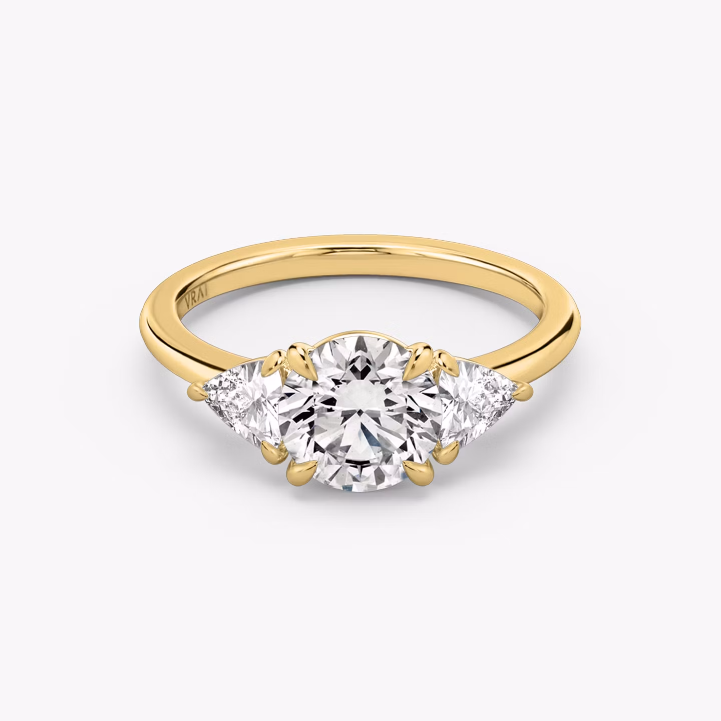 The Three Stone Round Brilliant | Yellow Gold