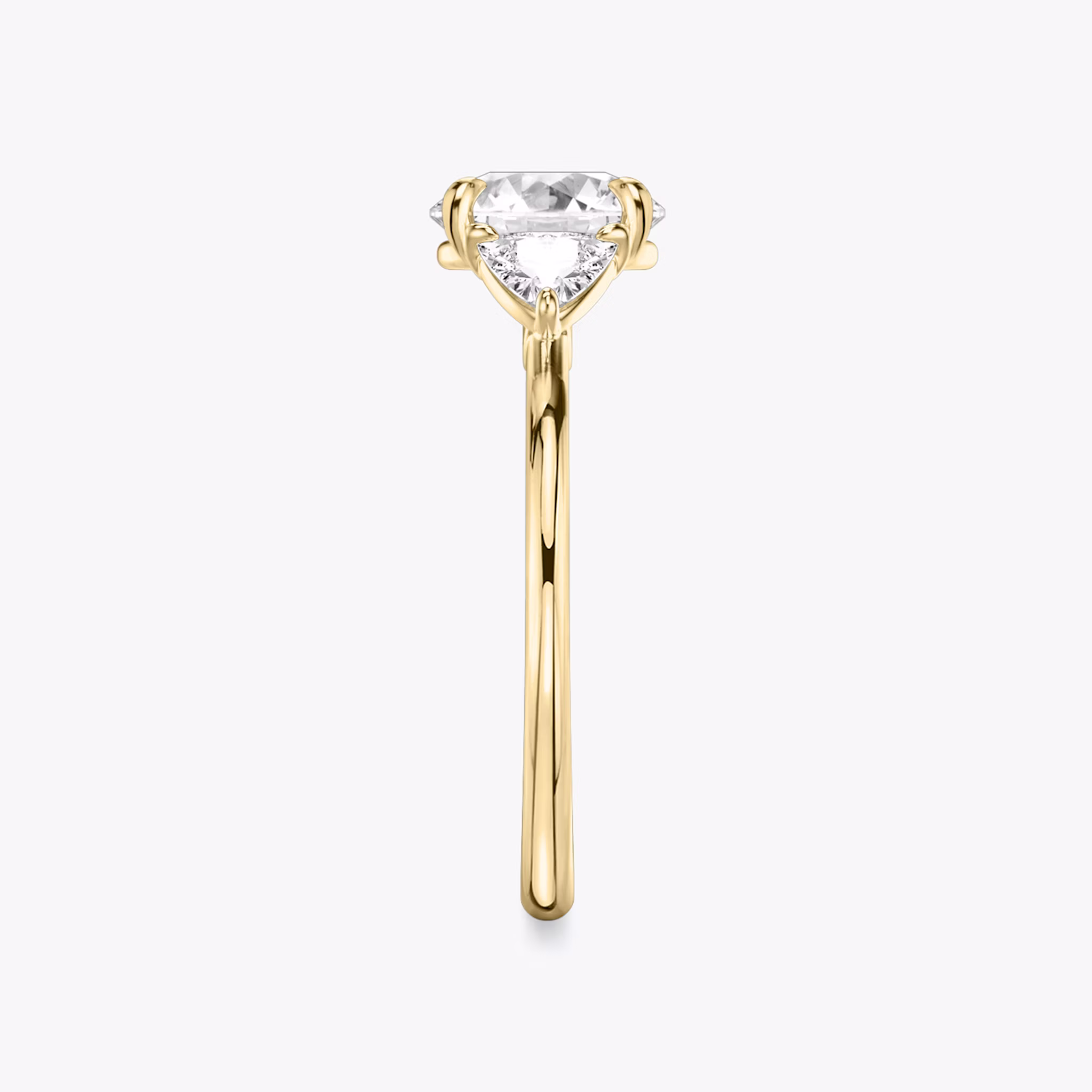 The Three Stone | Round Brilliant | 18k | Yellow Gold | bandAccent: Plain | caratWeight: other | sideStoneCarat: 0.25ct | sideStoneShape: Trillion | diamondOrientation: vertical