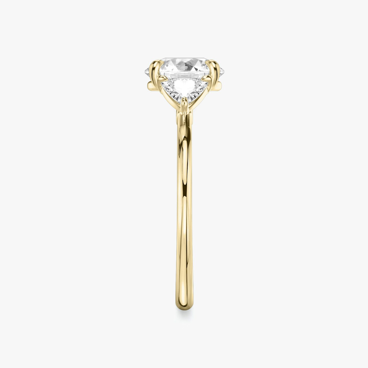 The Three Stone | Round Brilliant | 18k | Yellow Gold | bandAccent: Plain | caratWeight: other | sideStoneCarat: 0.25ct | sideStoneShape: Trillion | diamondOrientation: vertical
