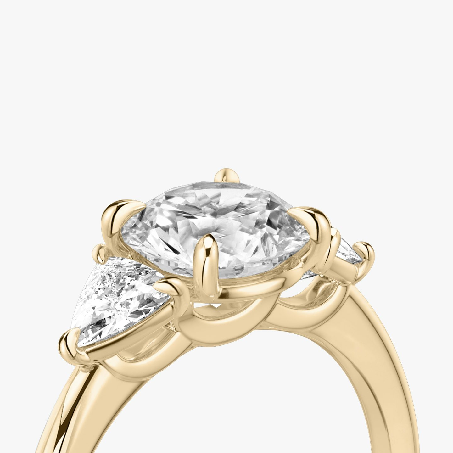 The Three Stone | Round Brilliant | 14k | Rose Gold | bandAccent: Plain | caratWeight: other | sideStoneCarat: 0.25ct | sideStoneShape: Trillion | diamondOrientation: vertical