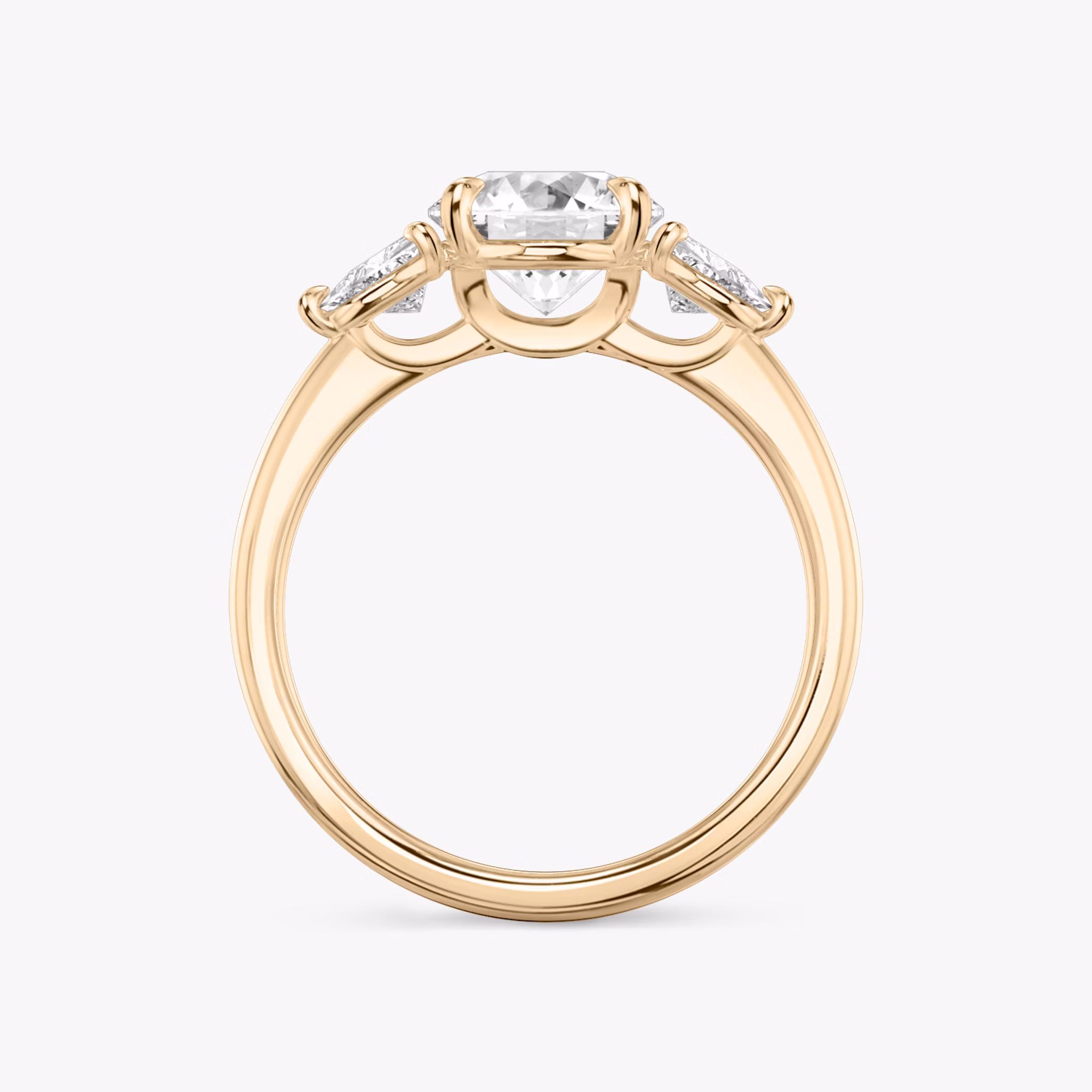 The Three Stone | Round Brilliant | 14k | Rose Gold | bandAccent: Plain | caratWeight: other | sideStoneCarat: 0.25ct | sideStoneShape: Trillion | diamondOrientation: vertical