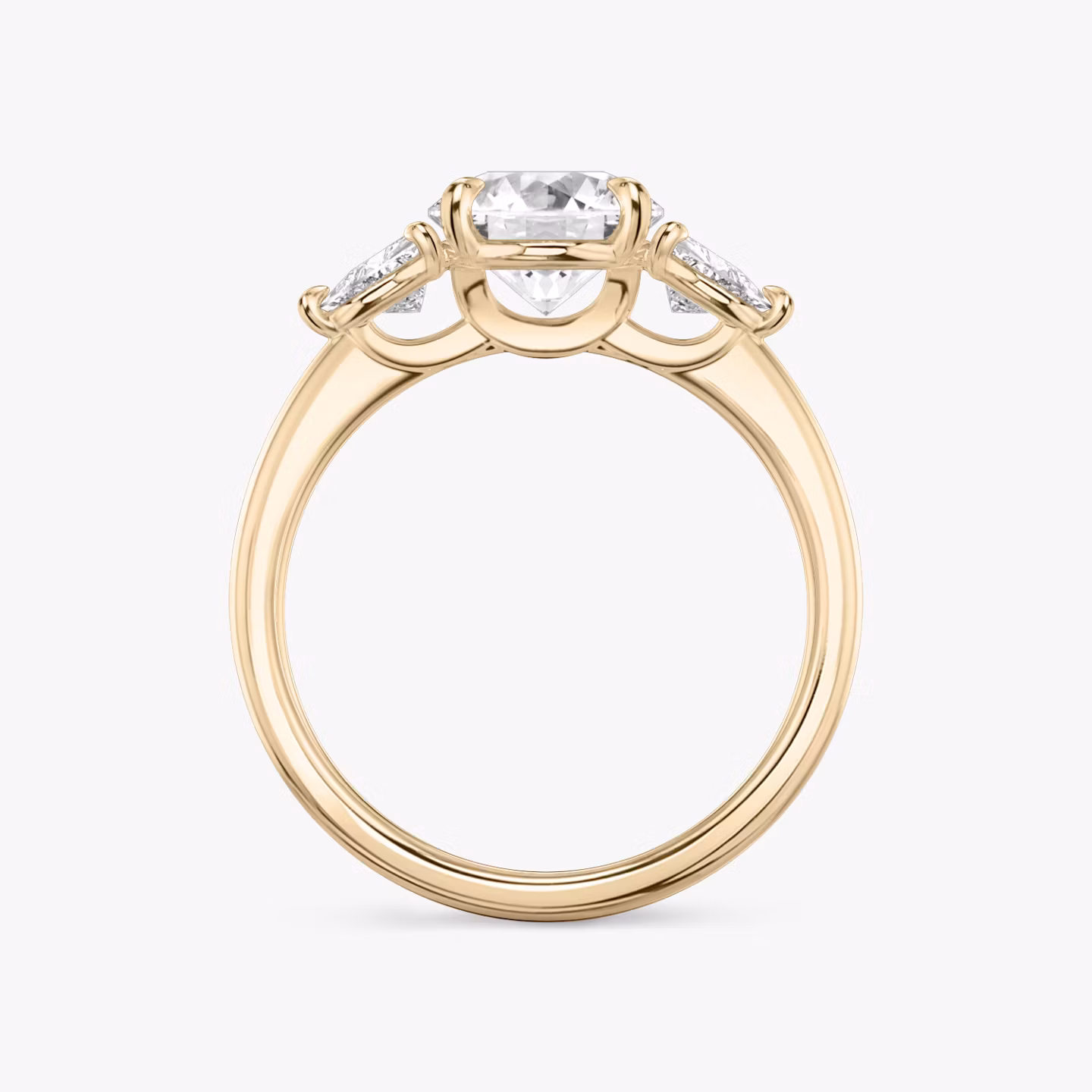 The Three Stone | Round Brilliant | 14k | Rose Gold | bandAccent: Plain | caratWeight: other | sideStoneCarat: 0.25ct | sideStoneShape: Trillion | diamondOrientation: vertical
