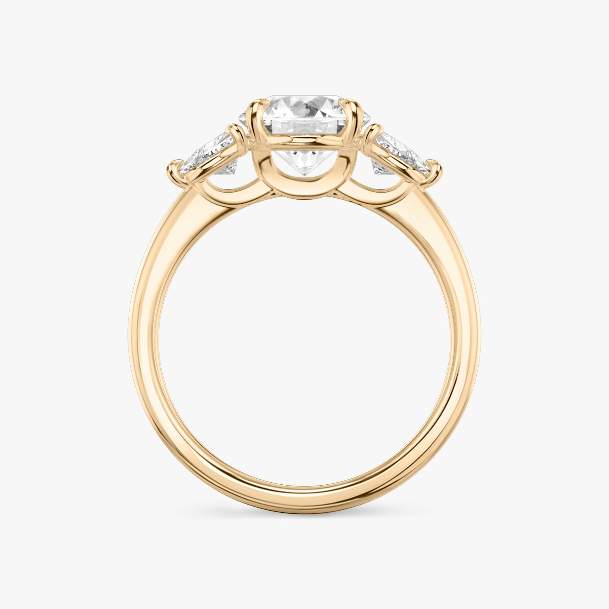 The Three Stone | Round Brilliant | 14k | Rose Gold | bandAccent: Plain | caratWeight: other | sideStoneCarat: 0.25ct | sideStoneShape: Trillion | diamondOrientation: vertical