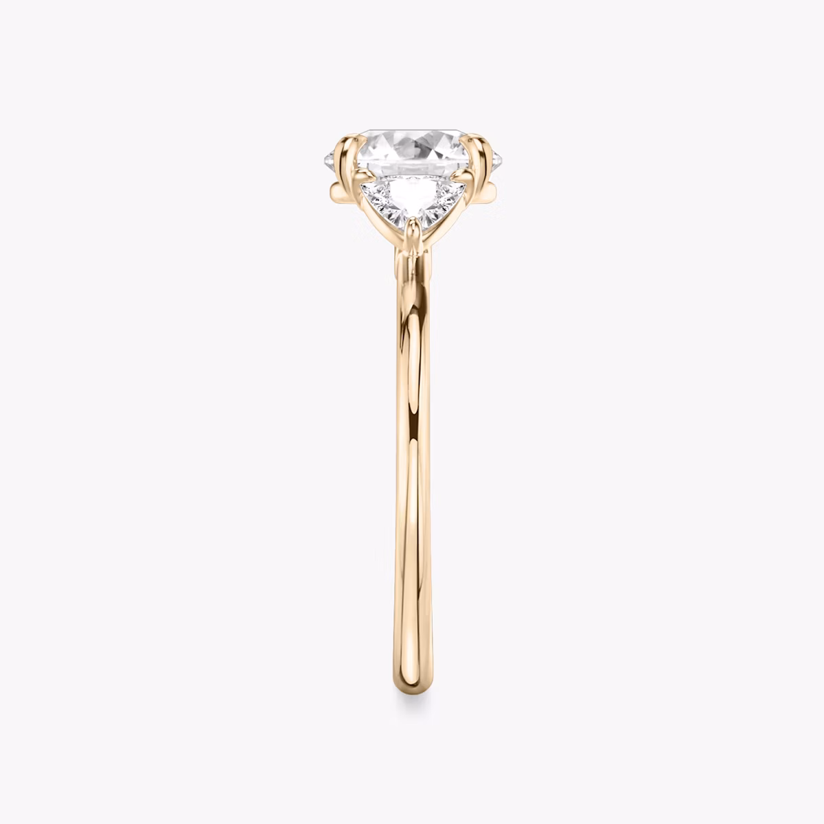 The Three Stone | Round Brilliant | 14k | Rose Gold | bandAccent: Plain | caratWeight: other | sideStoneCarat: 0.25ct | sideStoneShape: Trillion | diamondOrientation: vertical