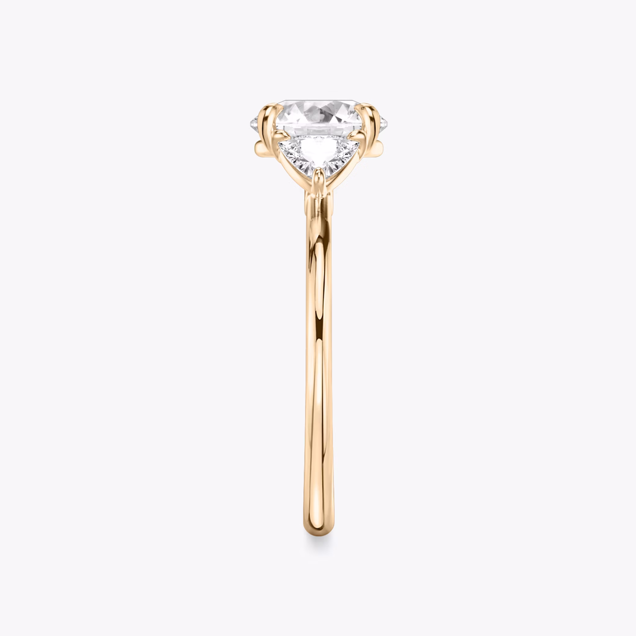 The Three Stone | Round Brilliant | 14k | Rose Gold | bandAccent: Plain | caratWeight: other | sideStoneCarat: 0.25ct | sideStoneShape: Trillion | diamondOrientation: vertical