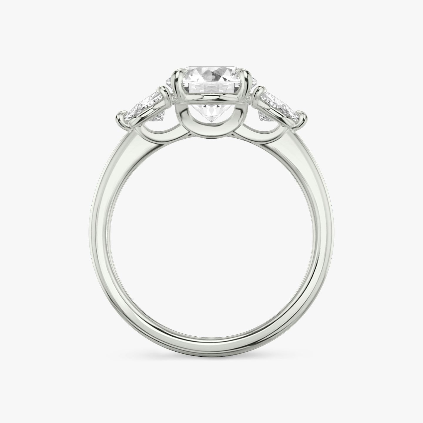 The Three Stone | Round Brilliant | Platinum | bandAccent: Plain | caratWeight: other | sideStoneCarat: 0.25ct | sideStoneShape: Trillion | diamondOrientation: vertical