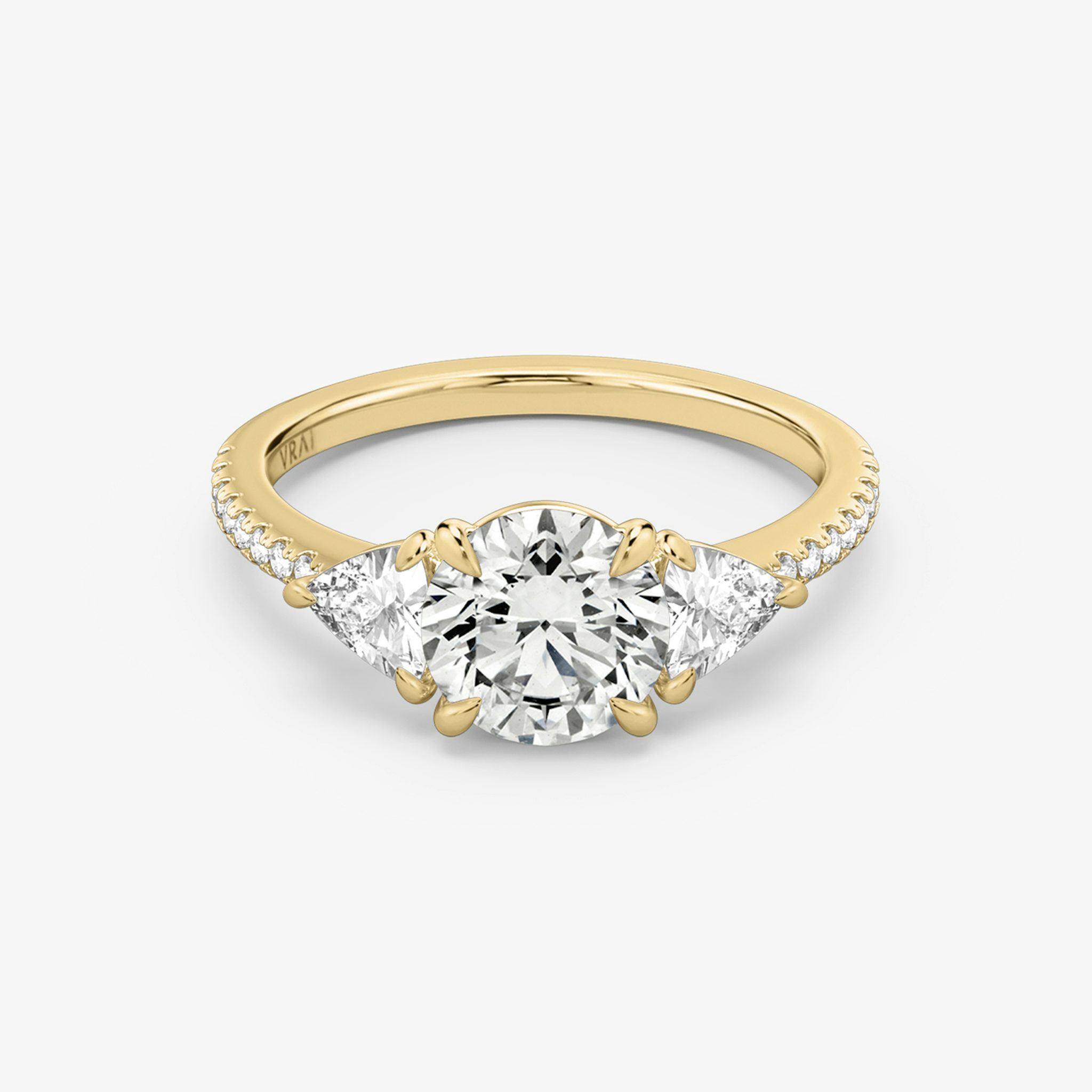 The Three Stone | Round Brilliant | 18k | Yellow Gold | bandAccent: Pavé | caratWeight: other | sideStoneCarat: 0.25ct | sideStoneShape: Trillion | diamondOrientation: vertical