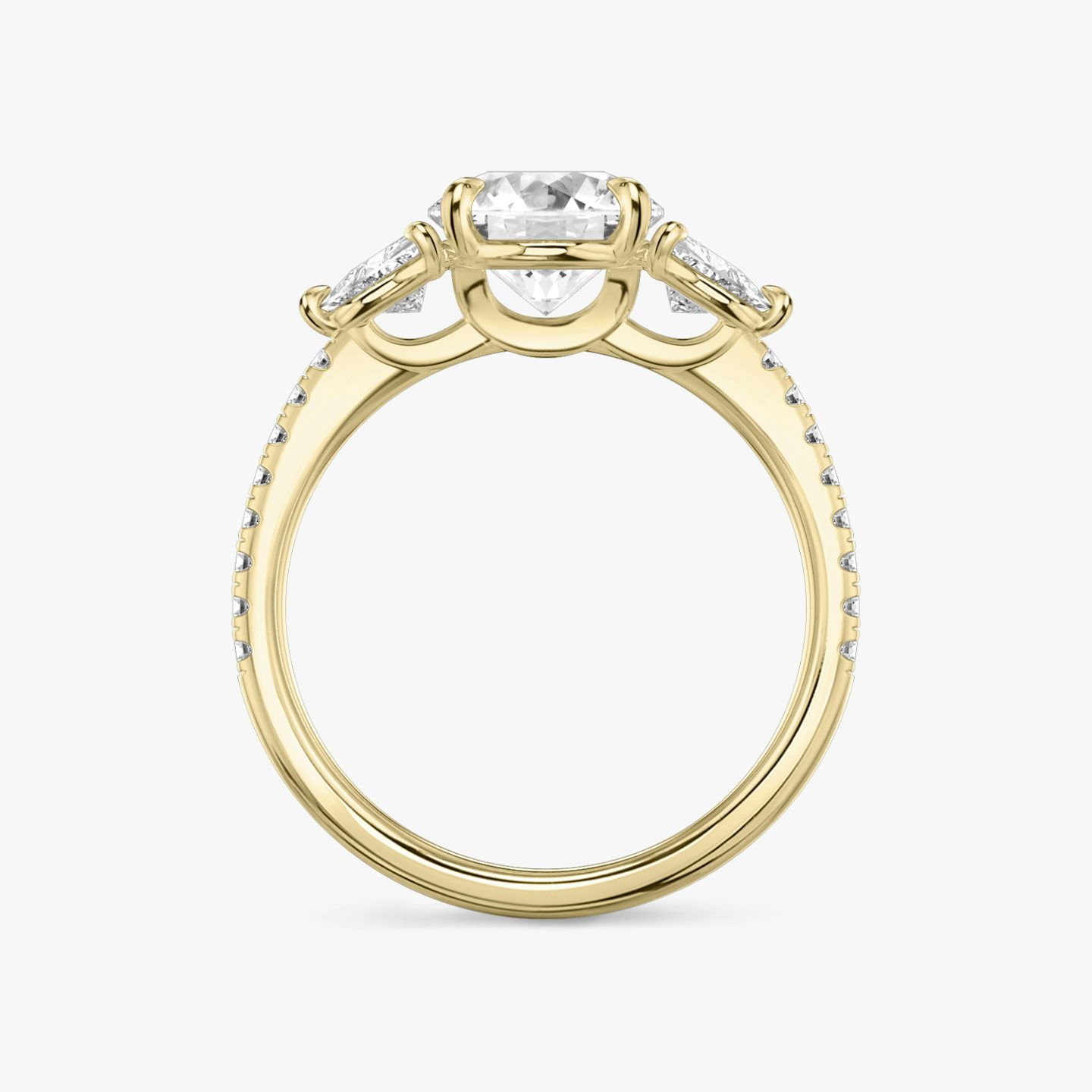 The Three Stone | Round Brilliant | 18k | Yellow Gold | bandAccent: Pavé | caratWeight: other | sideStoneCarat: 0.25ct | sideStoneShape: Trillion | diamondOrientation: vertical