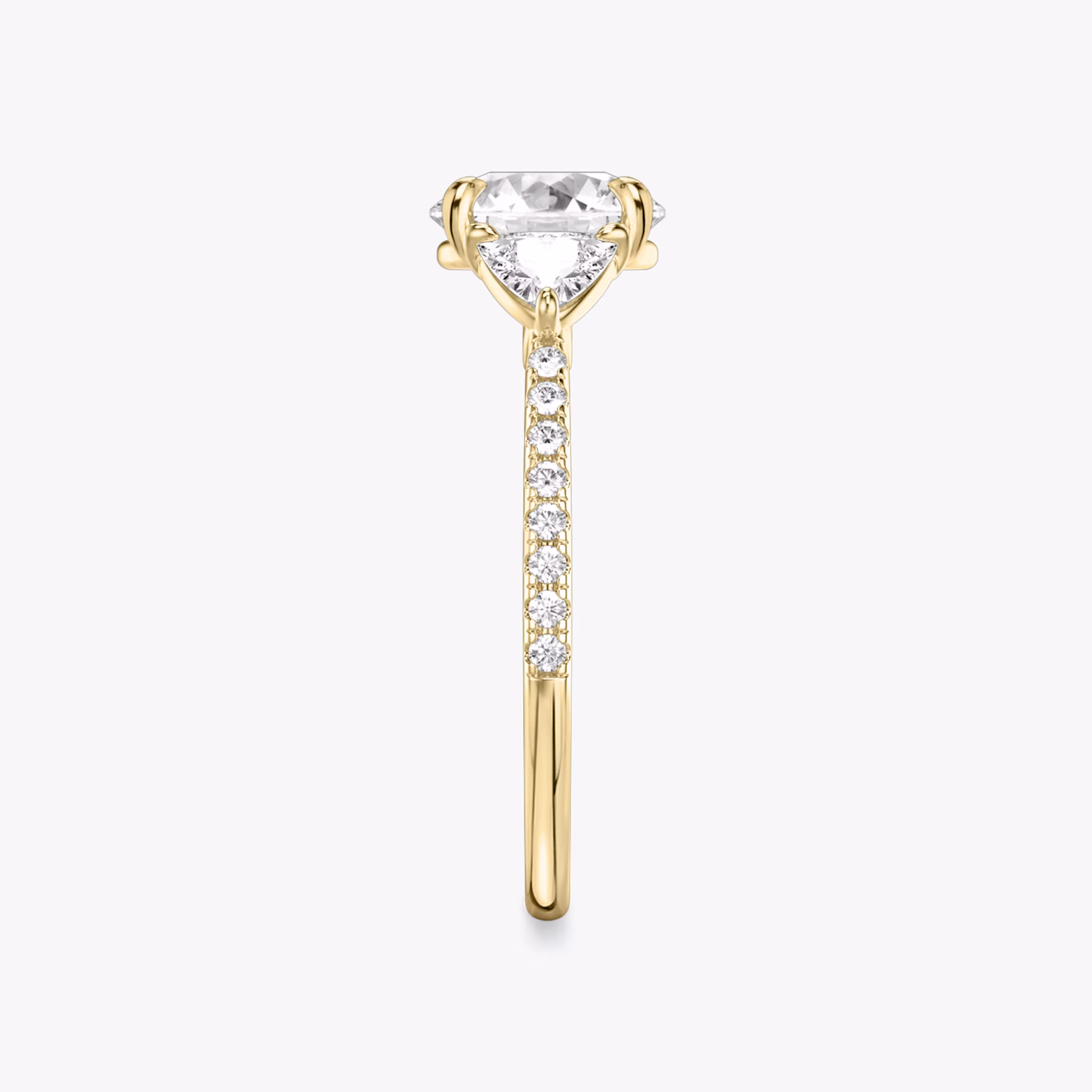The Three Stone | Round Brilliant | 18k | Yellow Gold | bandAccent: Pavé | caratWeight: other | sideStoneCarat: 0.25ct | sideStoneShape: Trillion | diamondOrientation: vertical