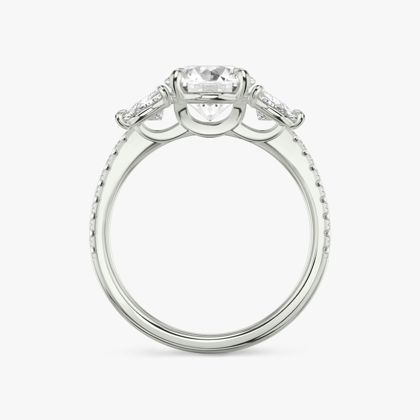 Anillo de compromiso Three Stone | Brillante | Platino | bandAccent: Pavé | caratWeight: other | sideStoneCarat: 0.25ct | sideStoneShape: Trillón | diamondOrientation: vertical