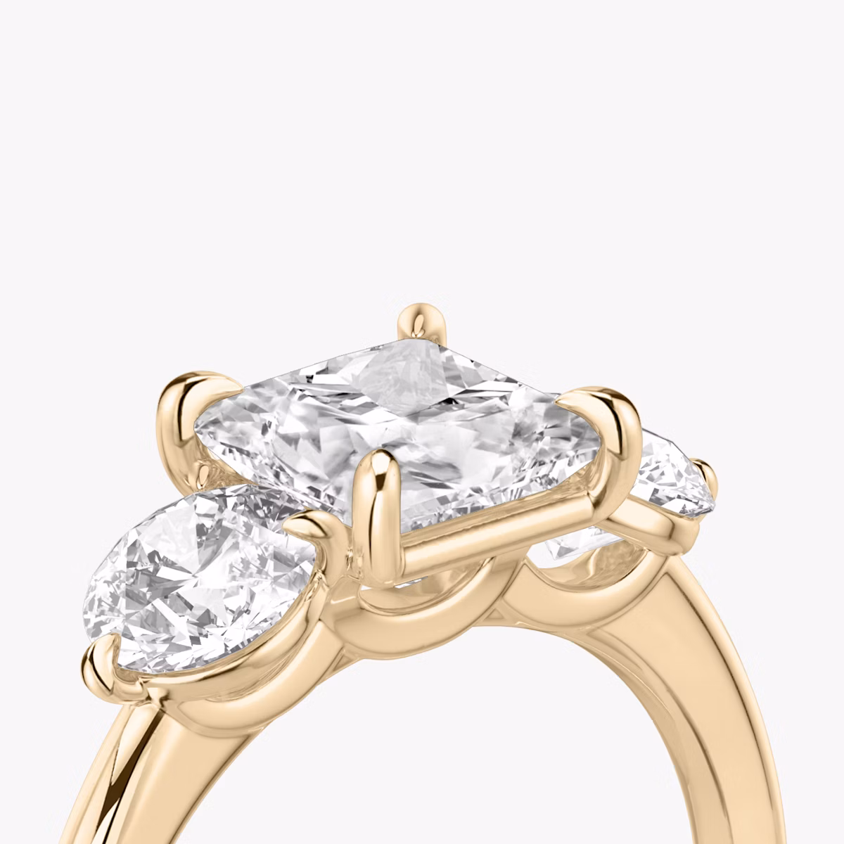 The Three Stone | Princess | 14k | Rose Gold | bandAccent: Plain | sideStoneCarat: 0.50ct | sideStoneShape: Round Brilliant | diamondOrientation: vertical | caratWeight: other