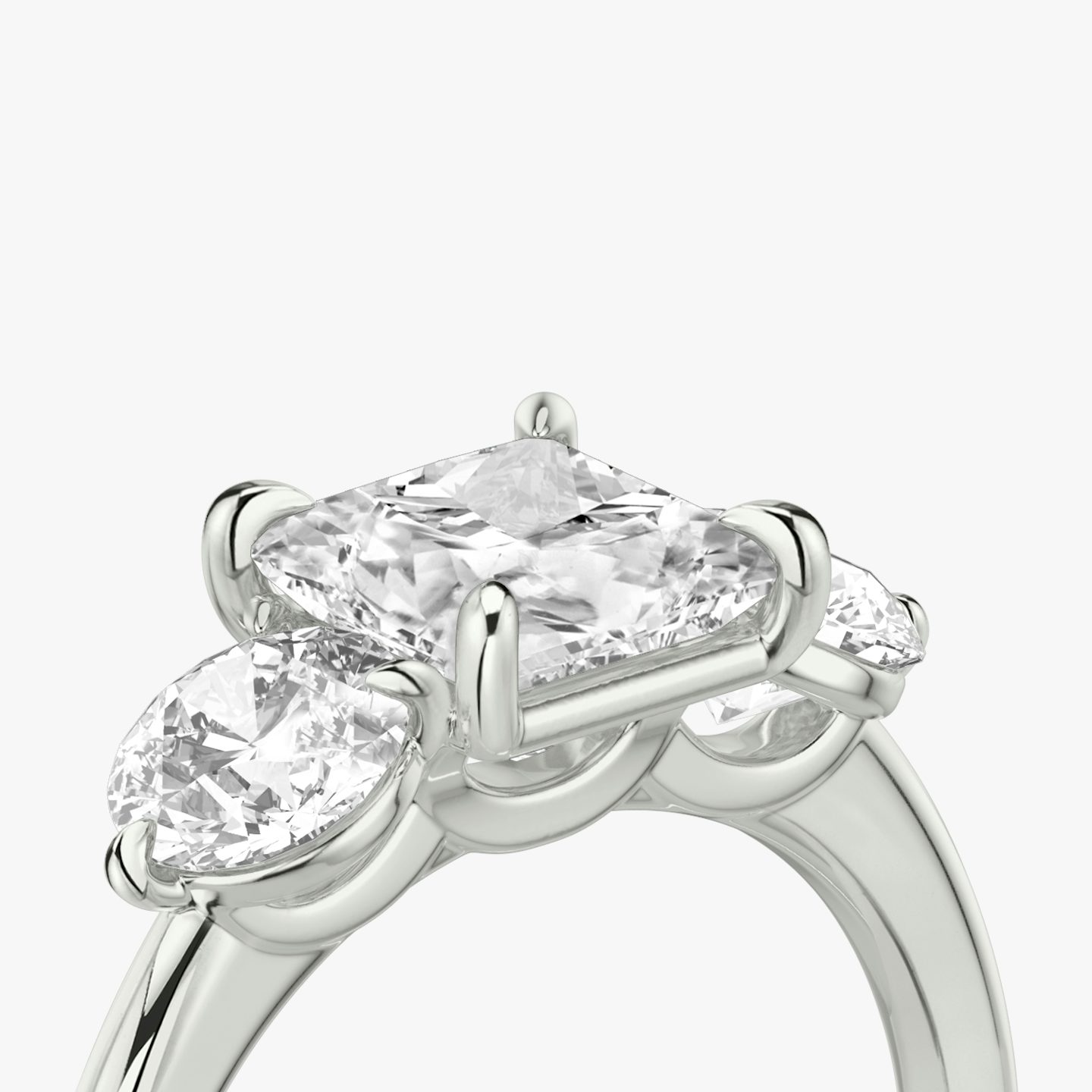 The Three Stone | Princess | Platinum | bandAccent: Plain | sideStoneCarat: 0.50ct | sideStoneShape: Round Brilliant | diamondOrientation: vertical | caratWeight: other