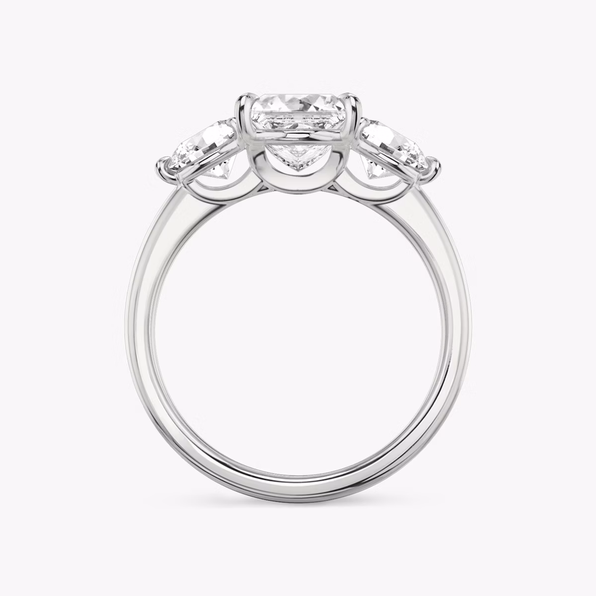 The Three Stone | Princess | Platinum | bandAccent: Plain | sideStoneCarat: 0.50ct | sideStoneShape: Round Brilliant | diamondOrientation: vertical | caratWeight: other