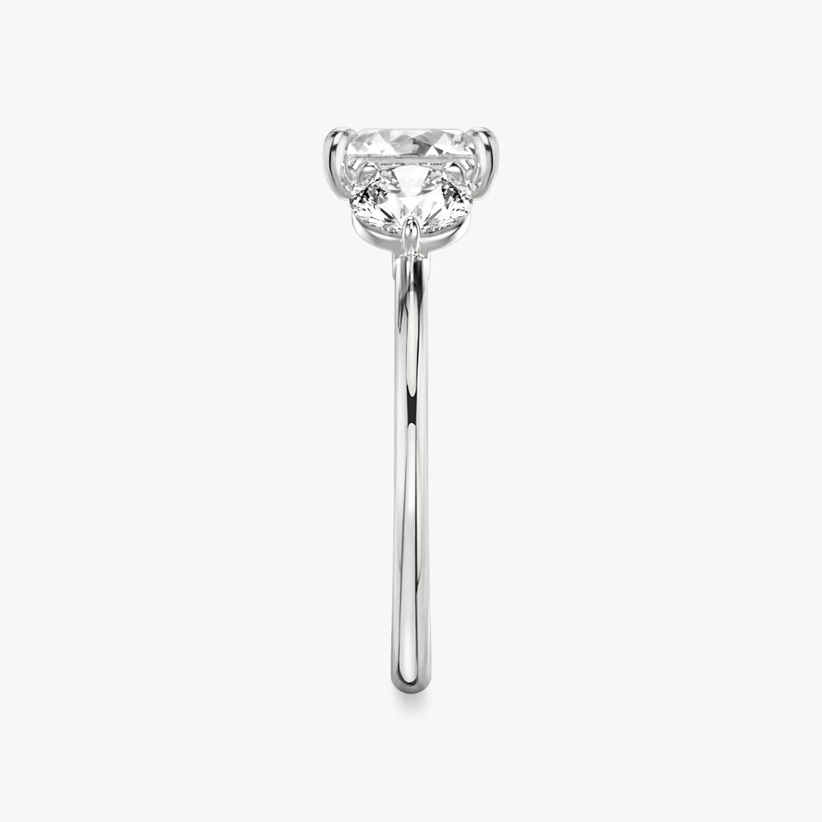 The Three Stone | Princess | Platinum | bandAccent: Plain | sideStoneCarat: 0.50ct | sideStoneShape: Round Brilliant | diamondOrientation: vertical | caratWeight: other