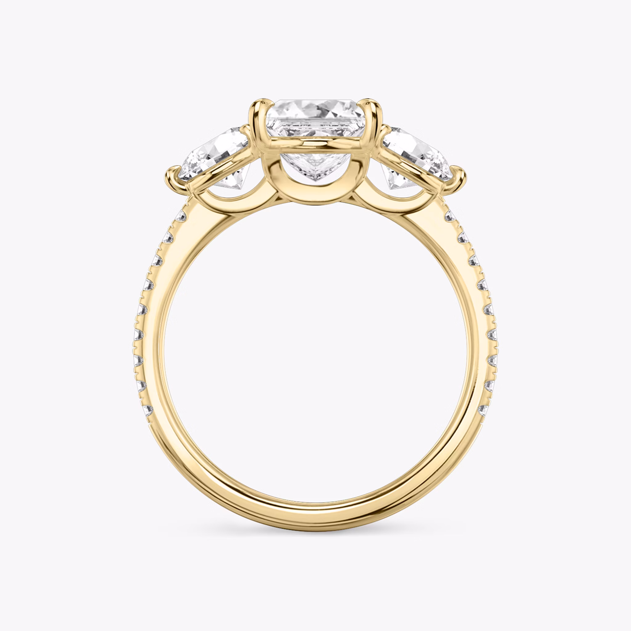 The Three Stone | Princess | 18k | Yellow Gold | bandAccent: Pavé | sideStoneCarat: 0.50ct | sideStoneShape: Round Brilliant | diamondOrientation: vertical | caratWeight: other