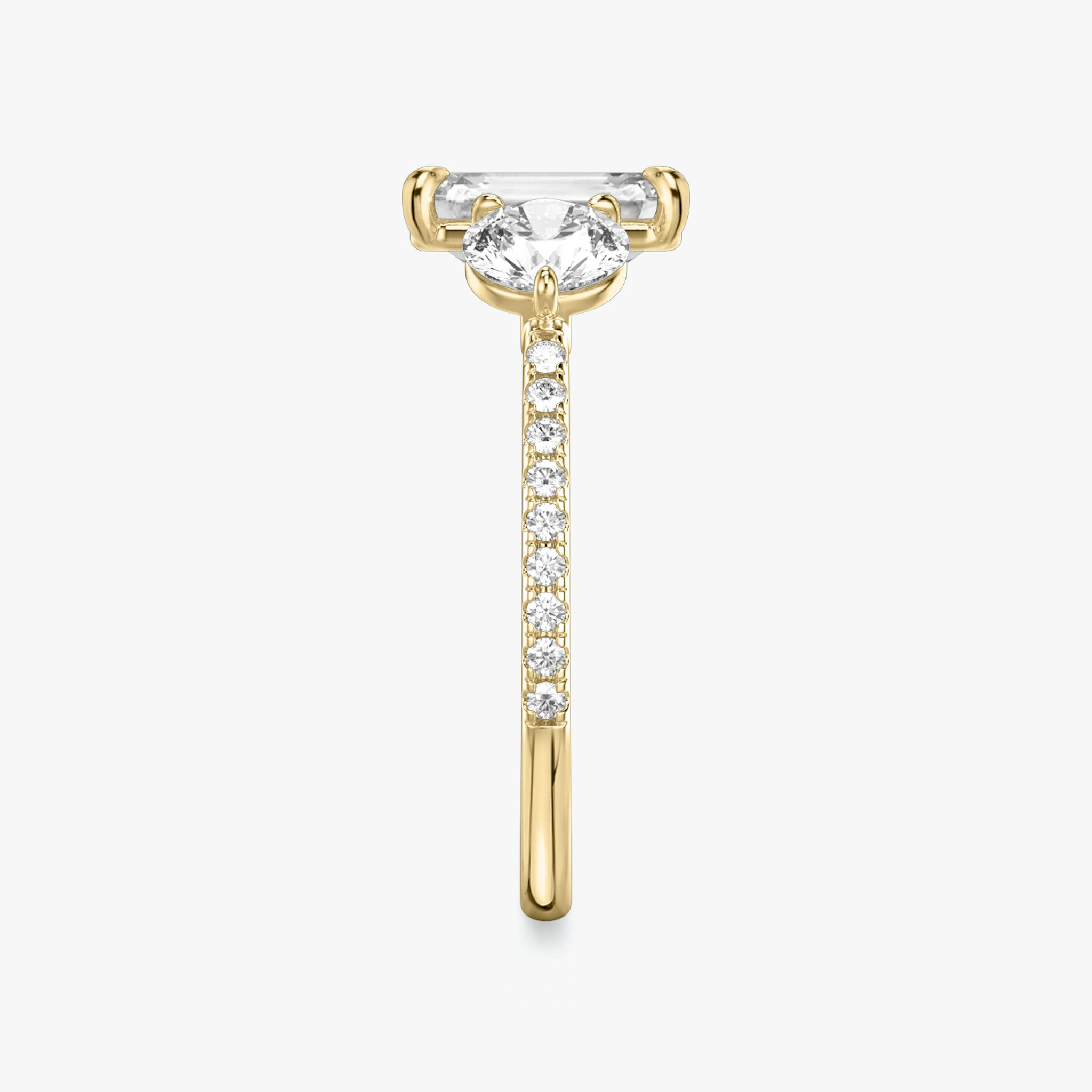 The Three Stone | Princess | 18k | Yellow Gold | bandAccent: Pavé | sideStoneCarat: 0.50ct | sideStoneShape: Round Brilliant | diamondOrientation: vertical | caratWeight: other