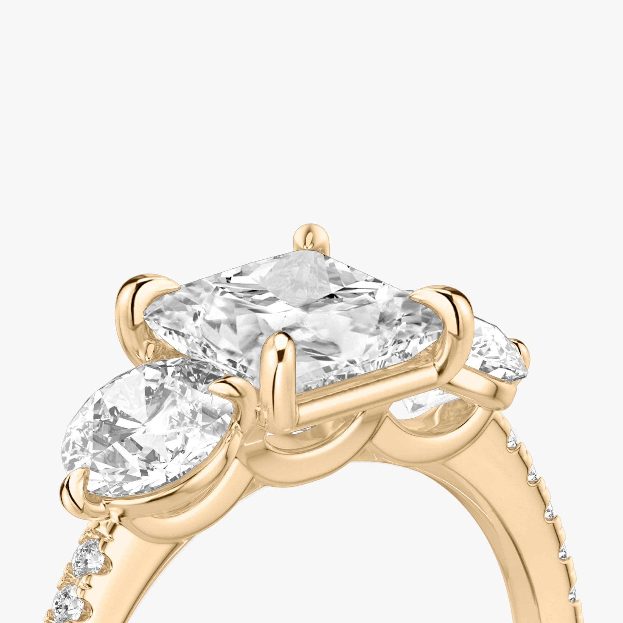 The Three Stone | Princess | 14k | Rose Gold | bandAccent: Pavé | sideStoneCarat: 0.50ct | sideStoneShape: Round Brilliant | diamondOrientation: vertical | caratWeight: other