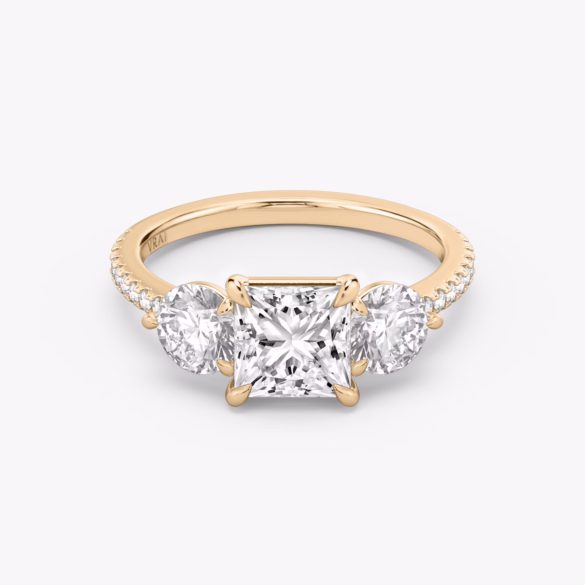 The Three Stone | Princess | 14k | Rose Gold | bandAccent: Pavé | sideStoneCarat: 0.50ct | sideStoneShape: Round Brilliant | diamondOrientation: vertical | caratWeight: other