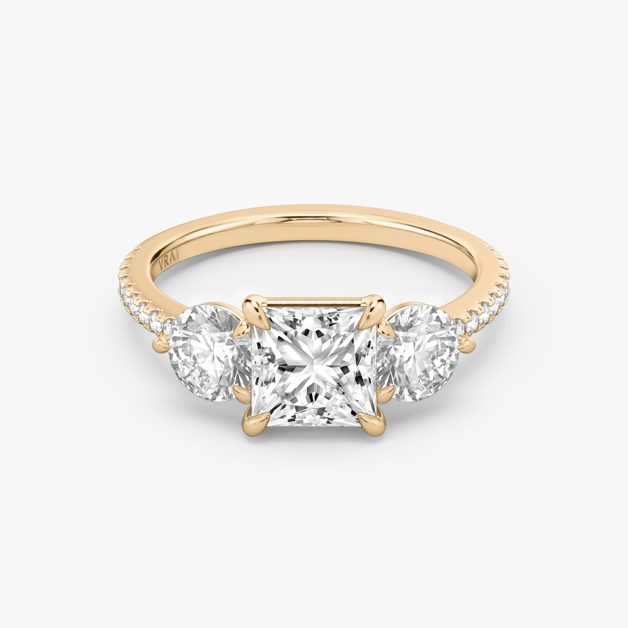 The Three Stone | Princess | 14k | Rose Gold | bandAccent: Pavé | sideStoneCarat: 0.50ct | sideStoneShape: Round Brilliant | diamondOrientation: vertical | caratWeight: other