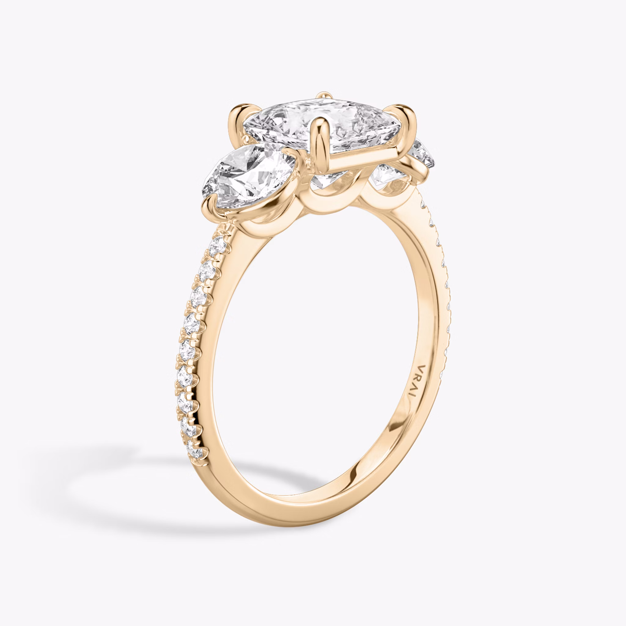The Three Stone | Princess | 14k | Rose Gold | bandAccent: Pavé | sideStoneCarat: 0.50ct | sideStoneShape: Round Brilliant | diamondOrientation: vertical | caratWeight: other