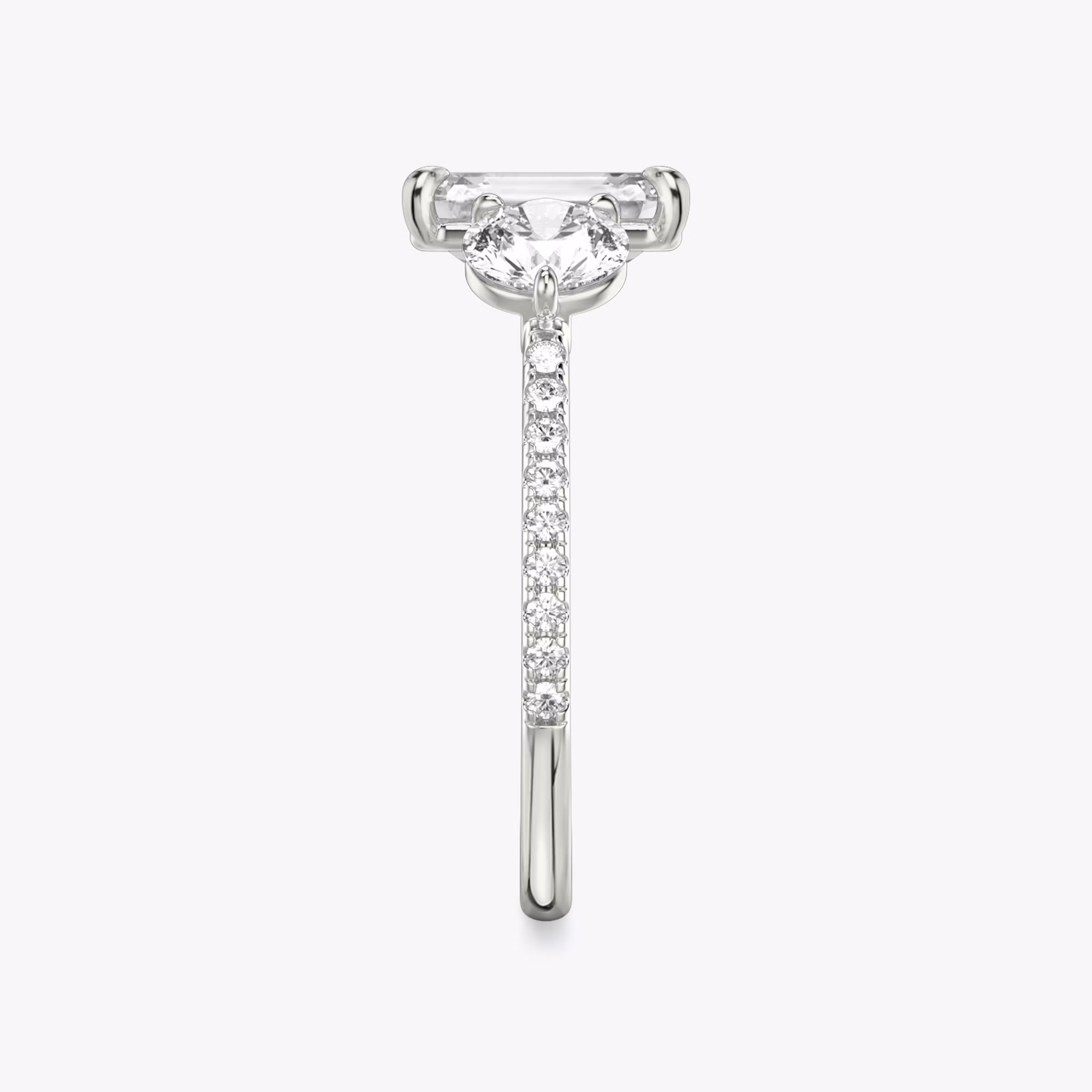 The Three Stone | Princess | Platinum | bandAccent: Pavé | sideStoneCarat: 0.50ct | sideStoneShape: Round Brilliant | diamondOrientation: vertical | caratWeight: other