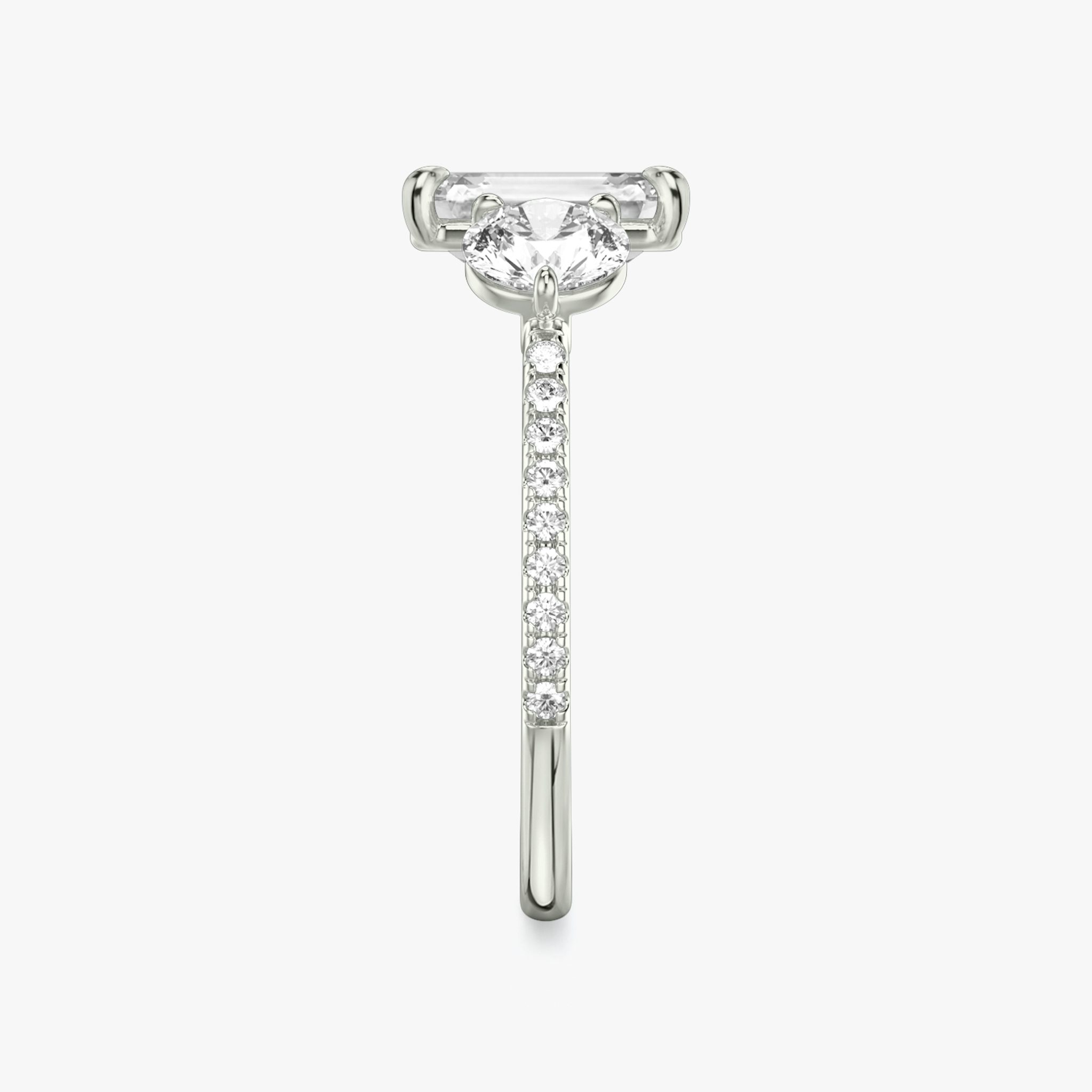 The Three Stone | Princess | Platinum | bandAccent: Pavé | sideStoneCarat: 0.50ct | sideStoneShape: Round Brilliant | diamondOrientation: vertical | caratWeight: other