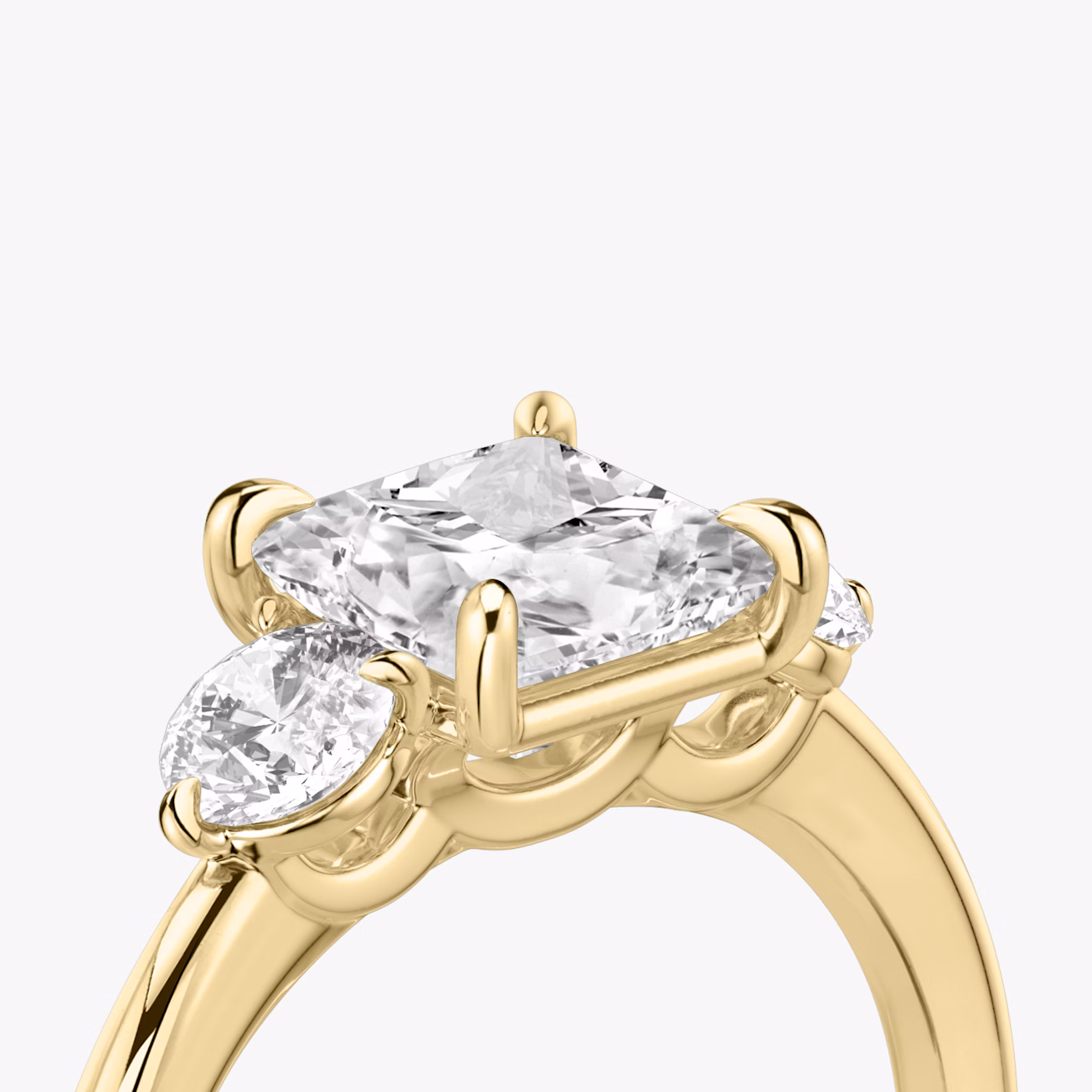 The Three Stone | Princess | 18k | Yellow Gold | bandAccent: Plain | sideStoneCarat: 0.25ct | sideStoneShape: Round Brilliant | diamondOrientation: vertical | caratWeight: other