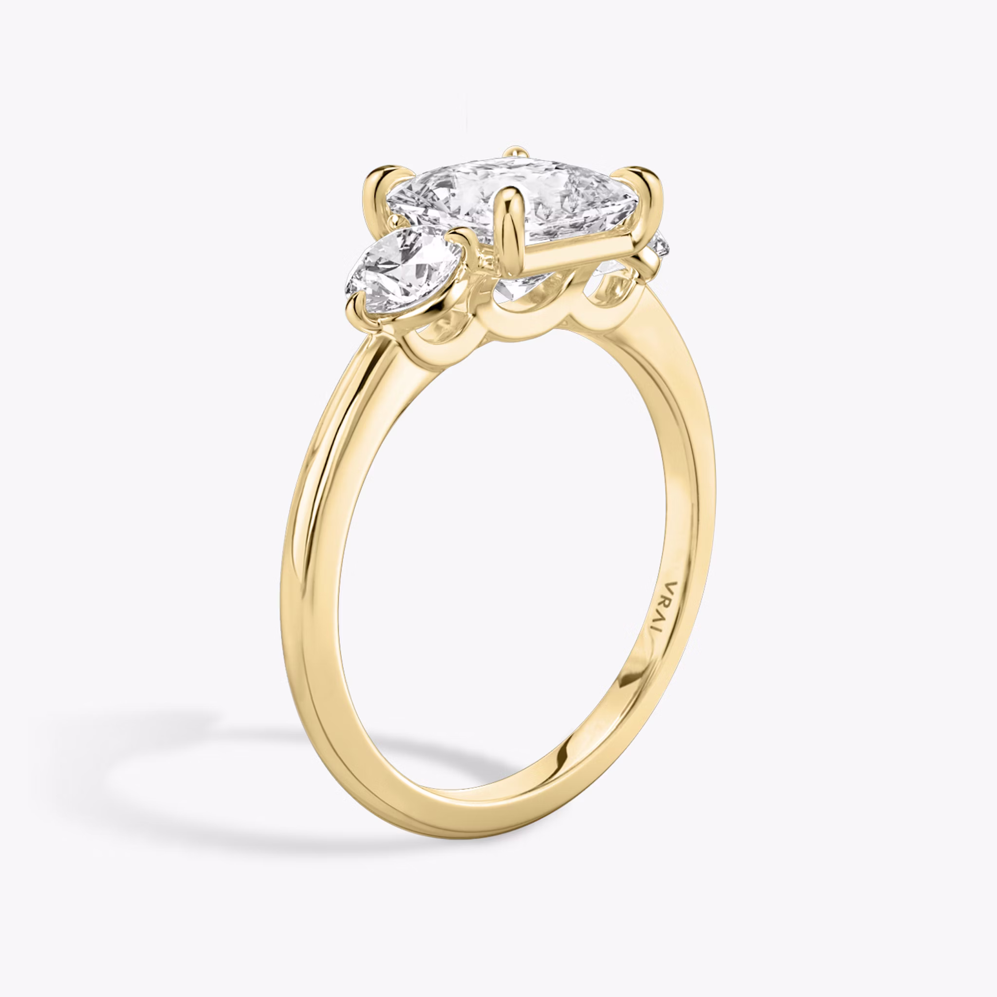 The Three Stone | Princess | 18k | Yellow Gold | bandAccent: Plain | sideStoneCarat: 0.25ct | sideStoneShape: Round Brilliant | diamondOrientation: vertical | caratWeight: other