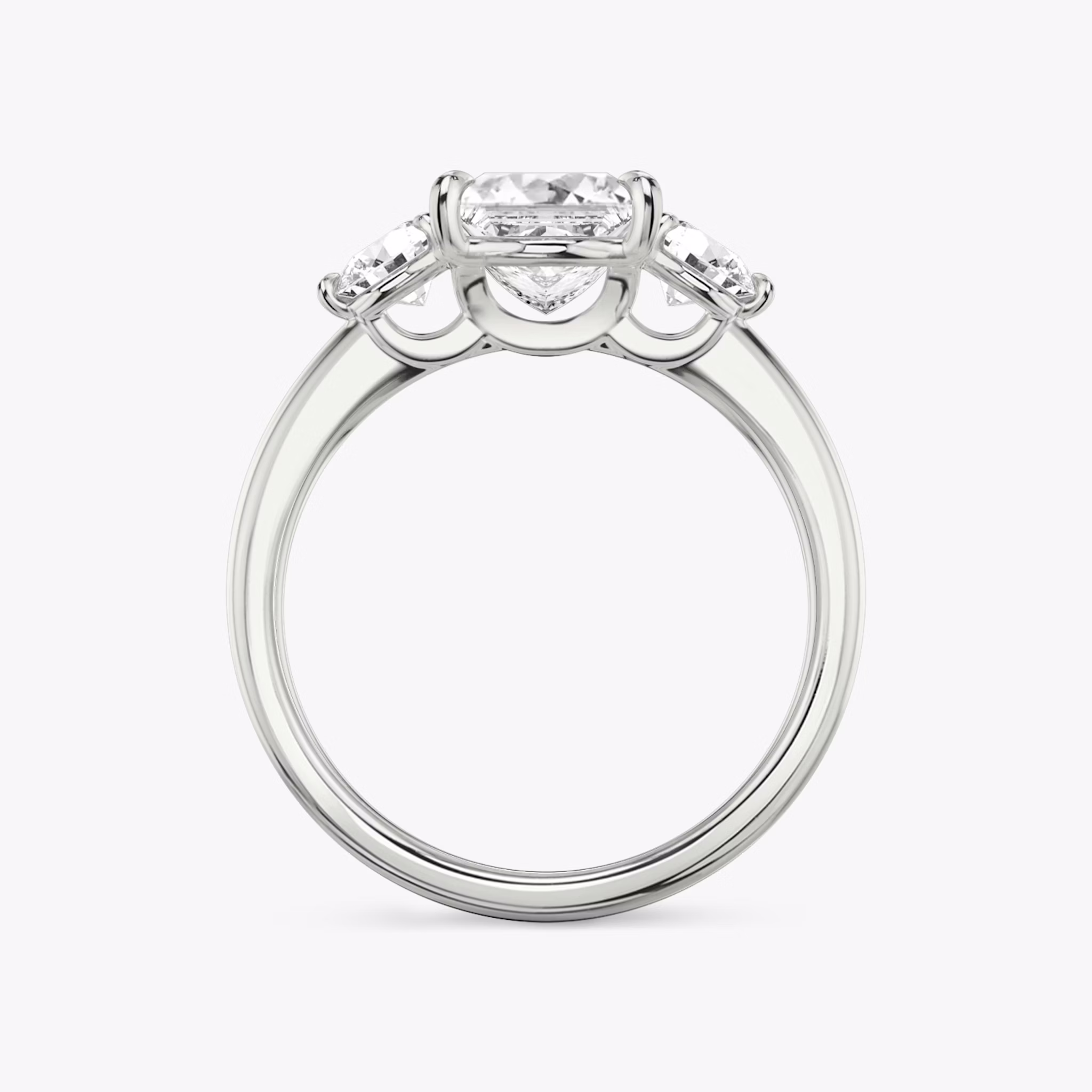 The Three Stone | Princess | Platinum | bandAccent: Plain | sideStoneCarat: 0.25ct | sideStoneShape: Round Brilliant | diamondOrientation: vertical | caratWeight: other