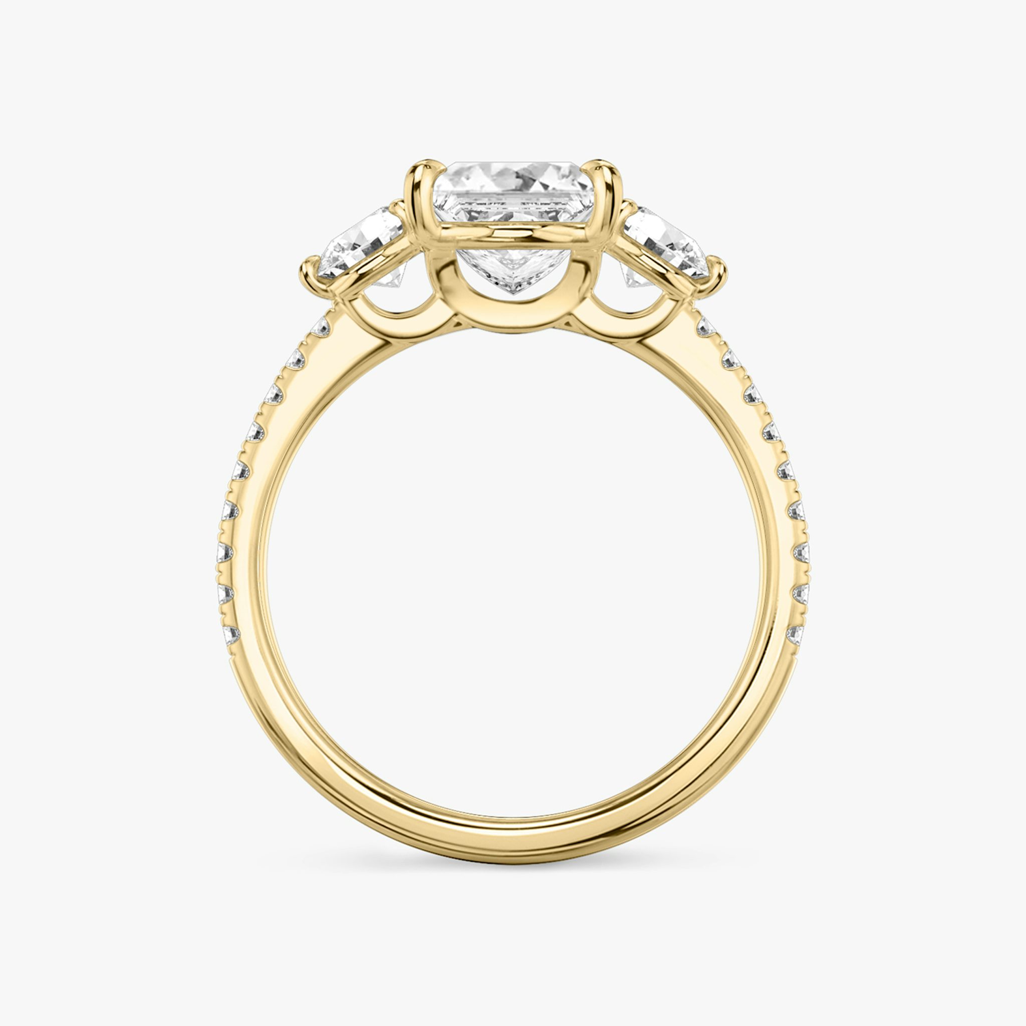 The Three Stone | Princess | 18k | Yellow Gold | bandAccent: Pavé | sideStoneCarat: 0.25ct | sideStoneShape: Round Brilliant | diamondOrientation: vertical | caratWeight: other