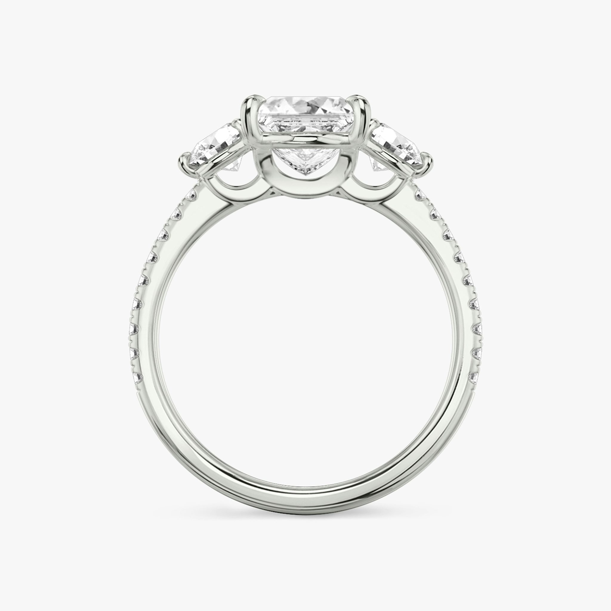 The Three Stone | Princess | 18k | White Gold | bandAccent: Pavé | sideStoneCarat: 0.25ct | sideStoneShape: Round Brilliant | diamondOrientation: vertical | caratWeight: other