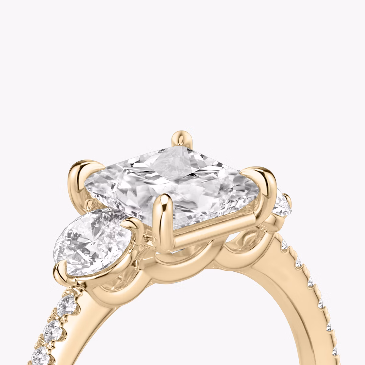 The Three Stone | Princess | 14k | Rose Gold | bandAccent: Pavé | sideStoneCarat: 0.25ct | sideStoneShape: Round Brilliant | diamondOrientation: vertical | caratWeight: other