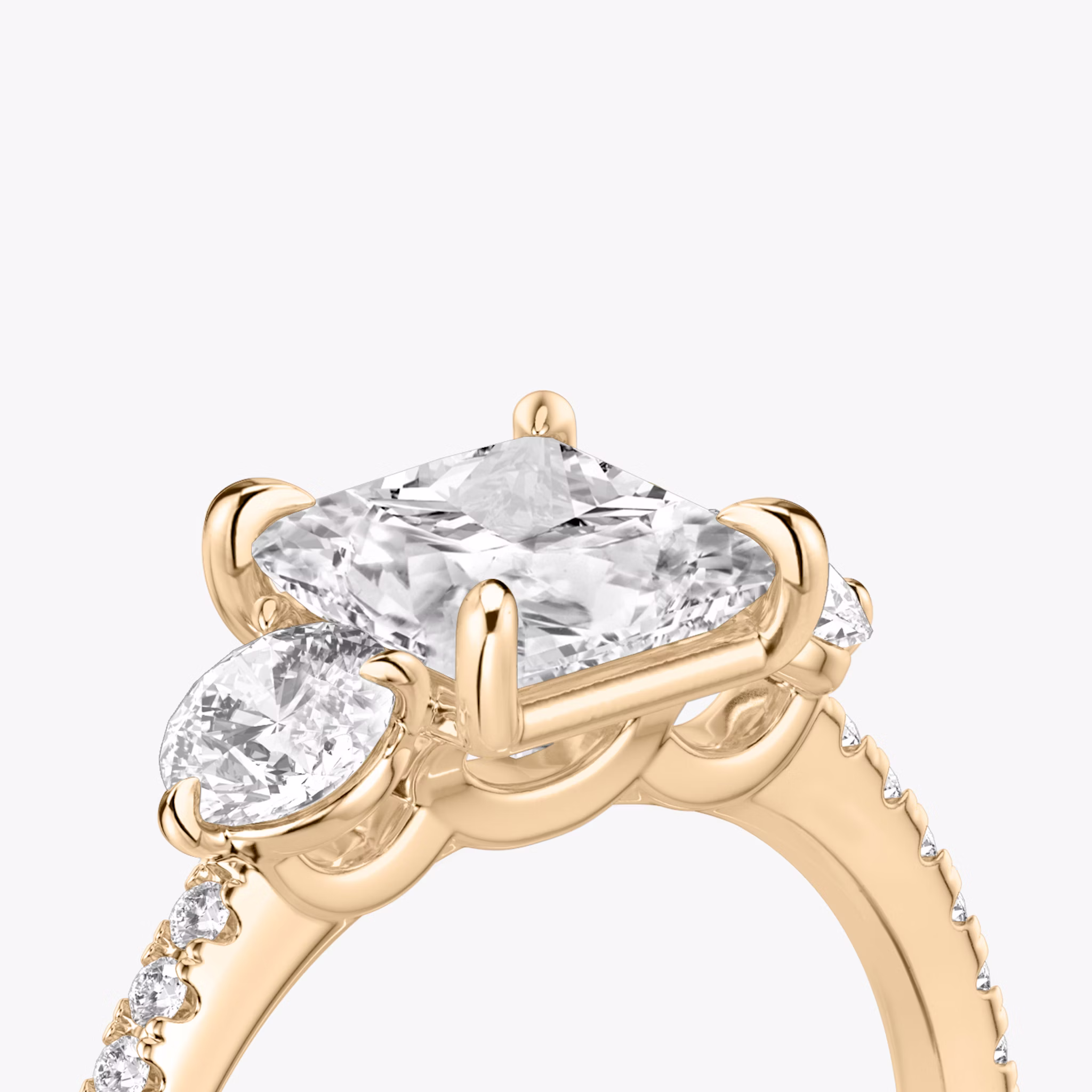The Three Stone | Princess | 14k | Rose Gold | bandAccent: Pavé | sideStoneCarat: 0.25ct | sideStoneShape: Round Brilliant | diamondOrientation: vertical | caratWeight: other