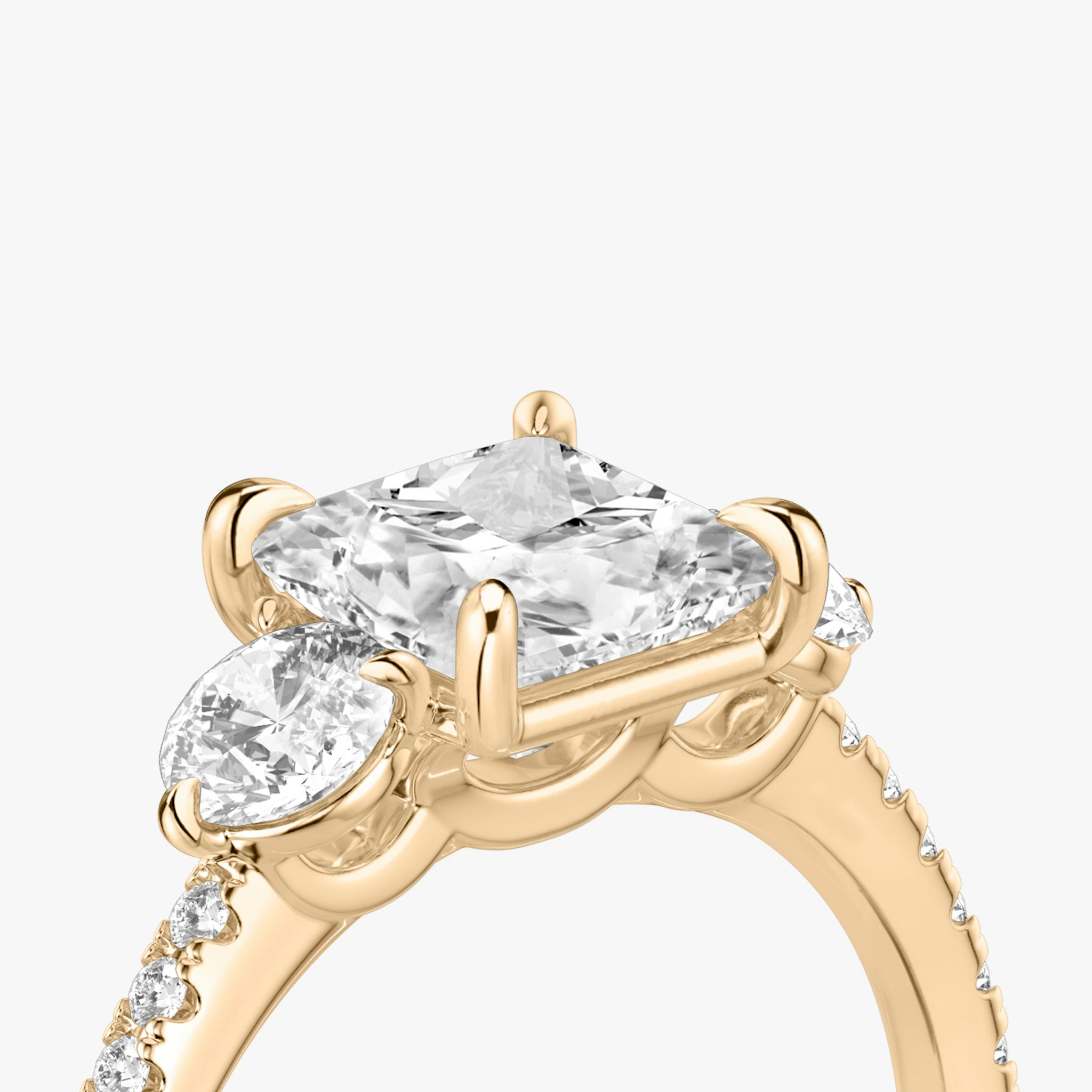 The Three Stone | Princess | 14k | Rose Gold | bandAccent: Pavé | sideStoneCarat: 0.25ct | sideStoneShape: Round Brilliant | diamondOrientation: vertical | caratWeight: other