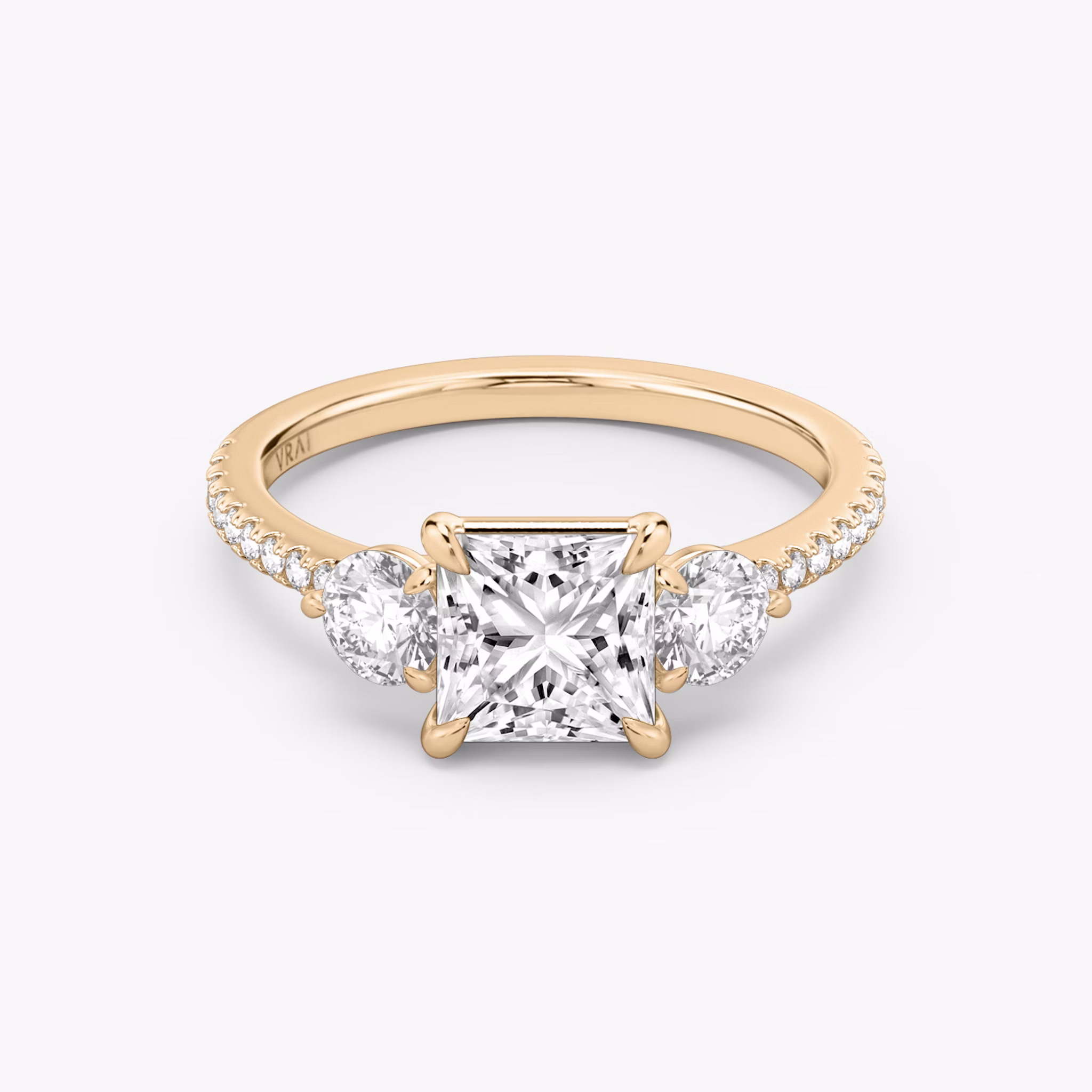 The Three Stone | Princess | 14k | Rose Gold | bandAccent: Pavé | sideStoneCarat: 0.25ct | sideStoneShape: Round Brilliant | diamondOrientation: vertical | caratWeight: other