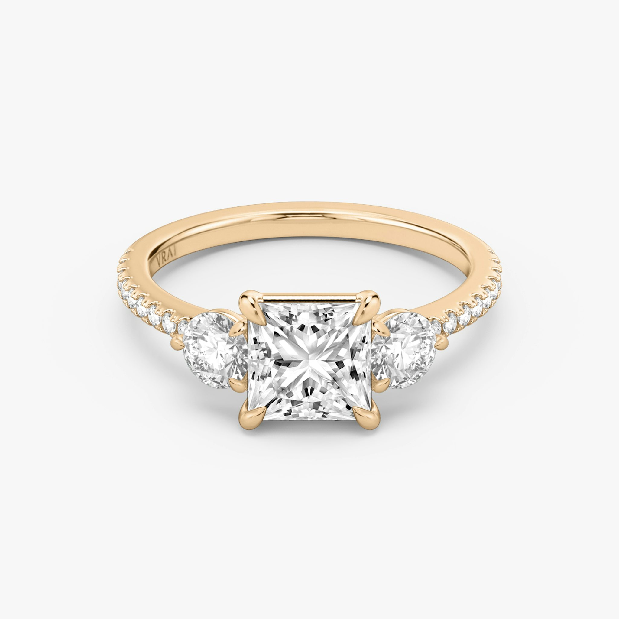 The Three Stone | Princess | 14k | Rose Gold | bandAccent: Pavé | sideStoneCarat: 0.25ct | sideStoneShape: Round Brilliant | diamondOrientation: vertical | caratWeight: other