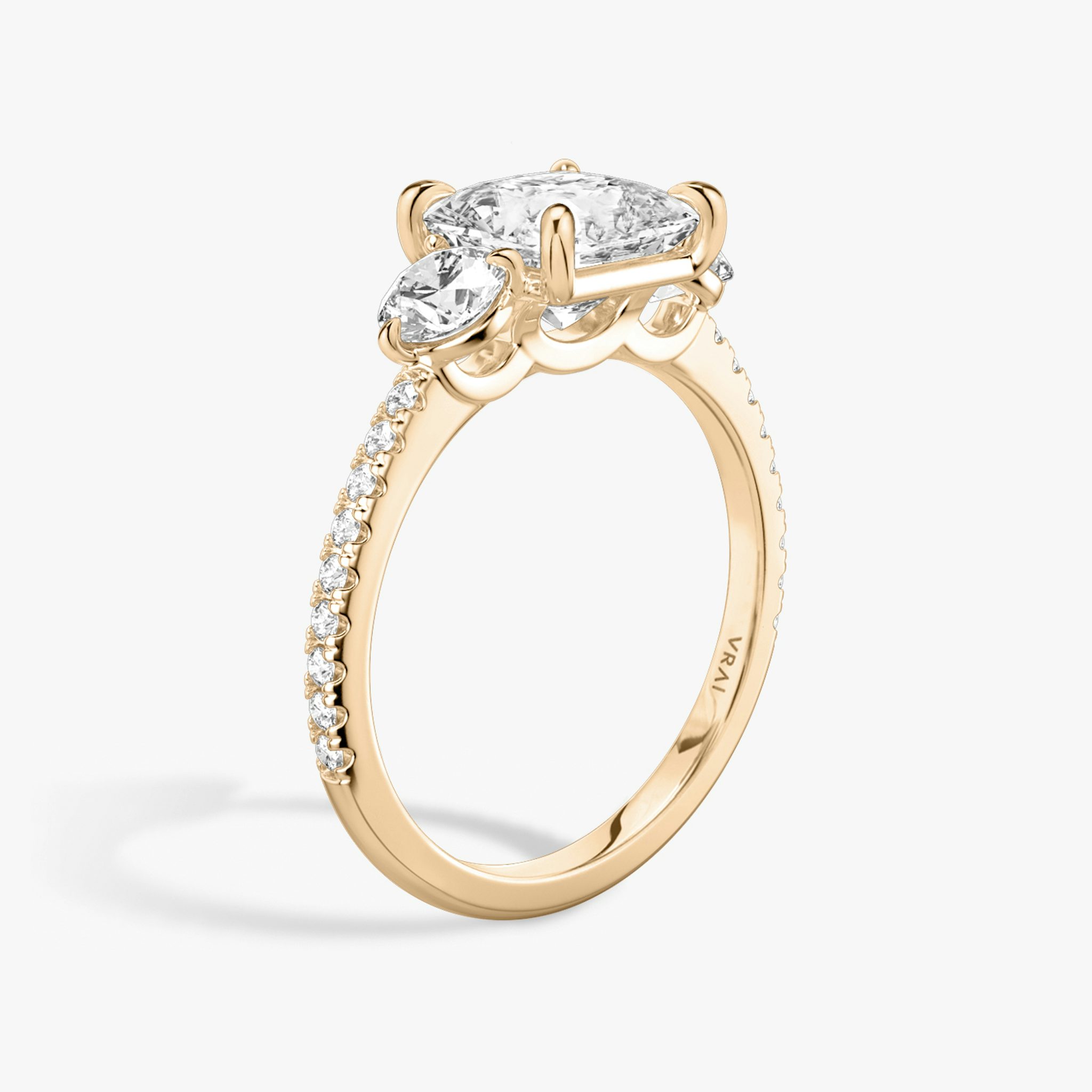 The Three Stone | Princess | 14k | Rose Gold | bandAccent: Pavé | sideStoneCarat: 0.25ct | sideStoneShape: Round Brilliant | diamondOrientation: vertical | caratWeight: other