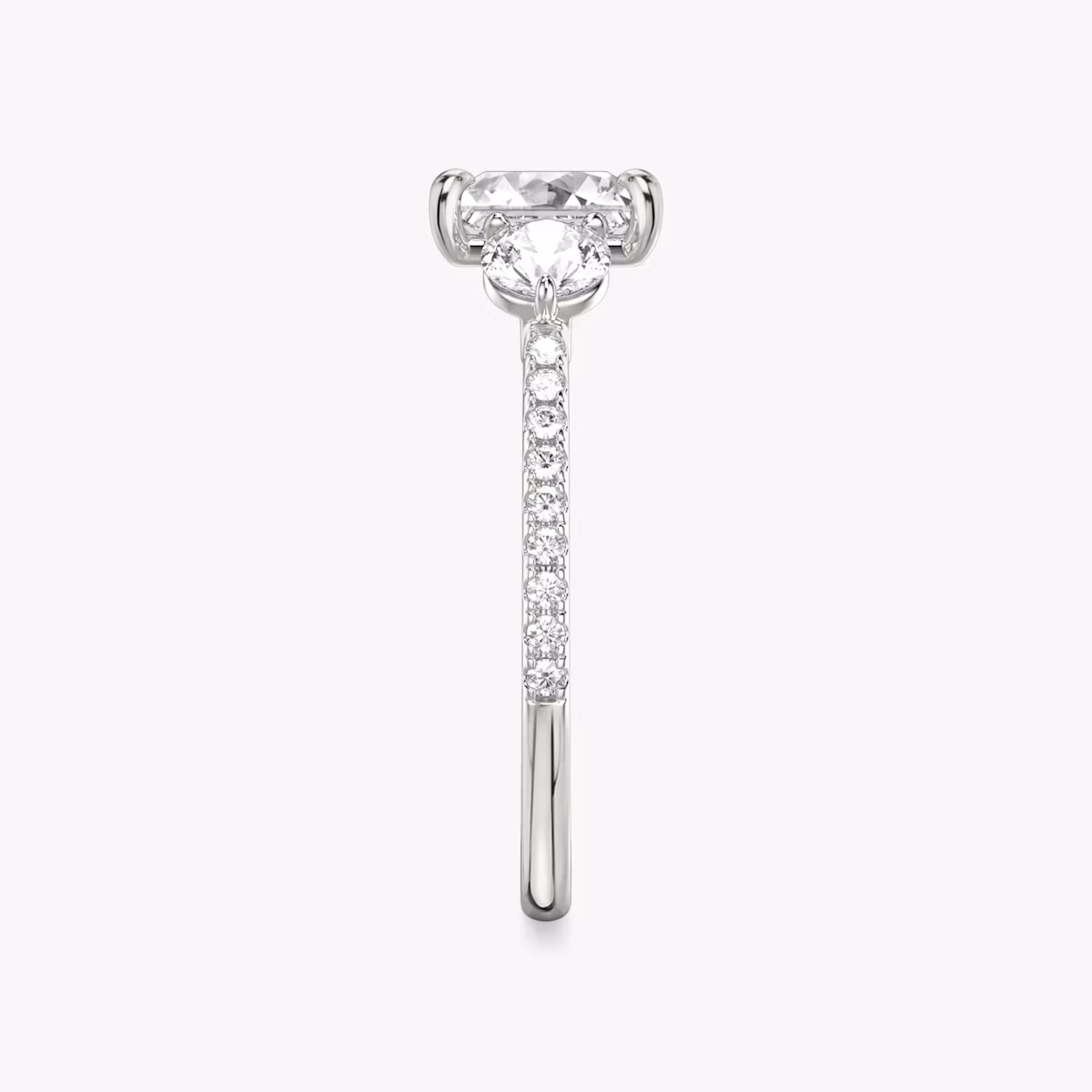 The Three Stone | Princess | Platinum | bandAccent: Pavé | sideStoneCarat: 0.25ct | sideStoneShape: Round Brilliant | diamondOrientation: vertical | caratWeight: other