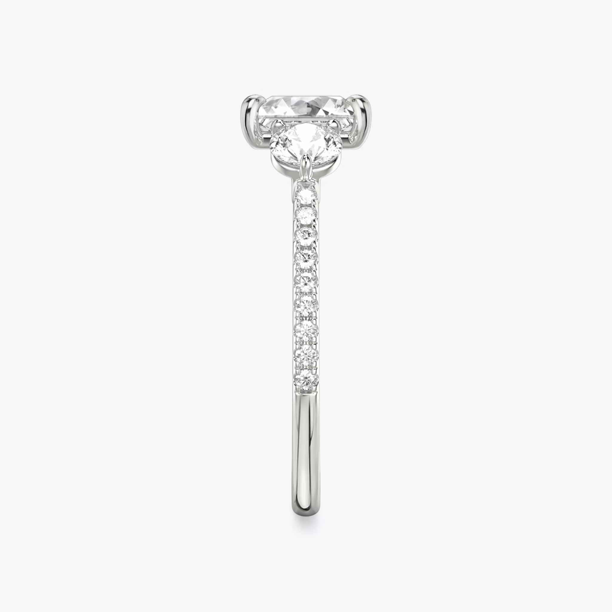 The Three Stone | Princess | Platinum | bandAccent: Pavé | sideStoneCarat: 0.25ct | sideStoneShape: Round Brilliant | diamondOrientation: vertical | caratWeight: other