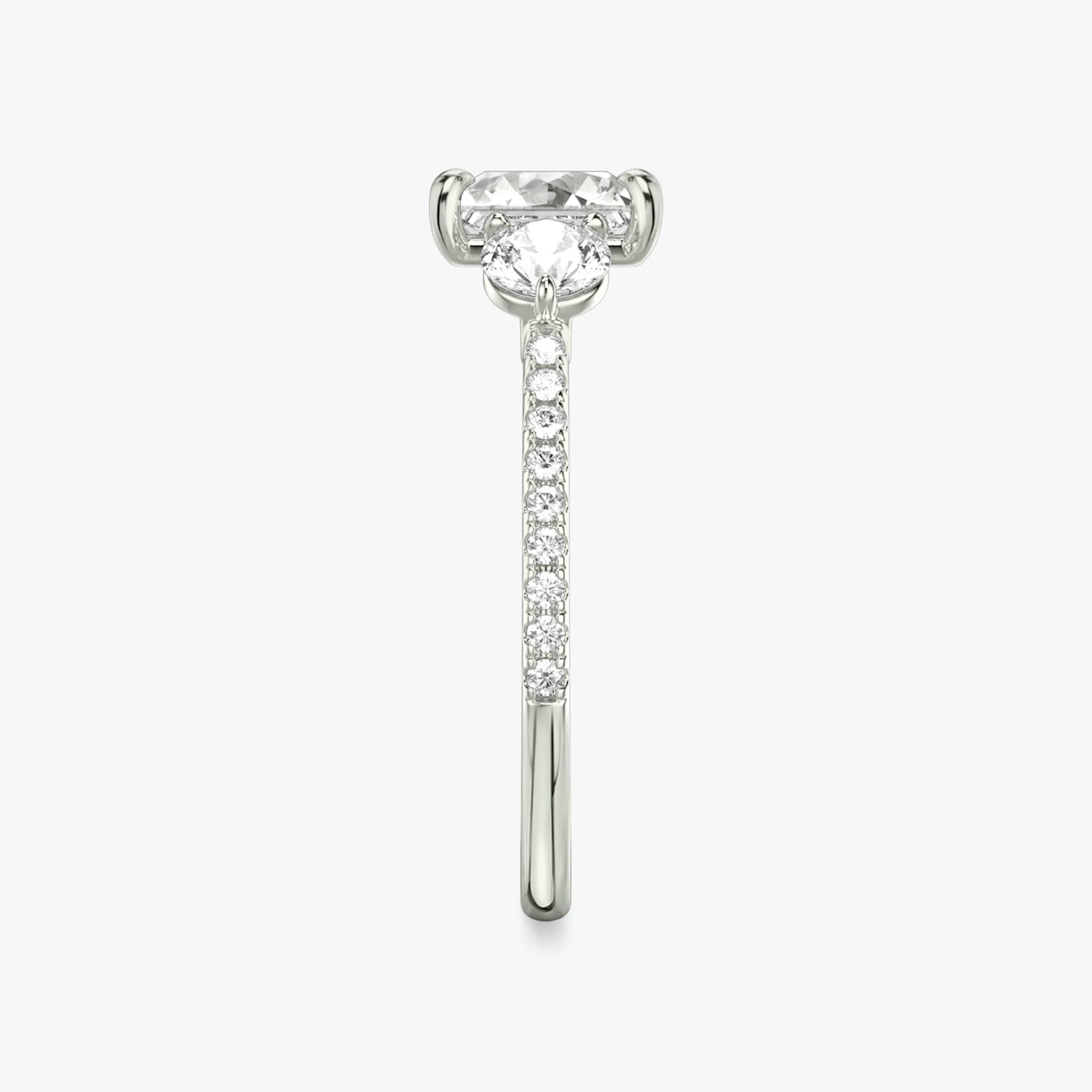 The Three Stone | Princess | Platinum | bandAccent: Pavé | sideStoneCarat: 0.25ct | sideStoneShape: Round Brilliant | diamondOrientation: vertical | caratWeight: other