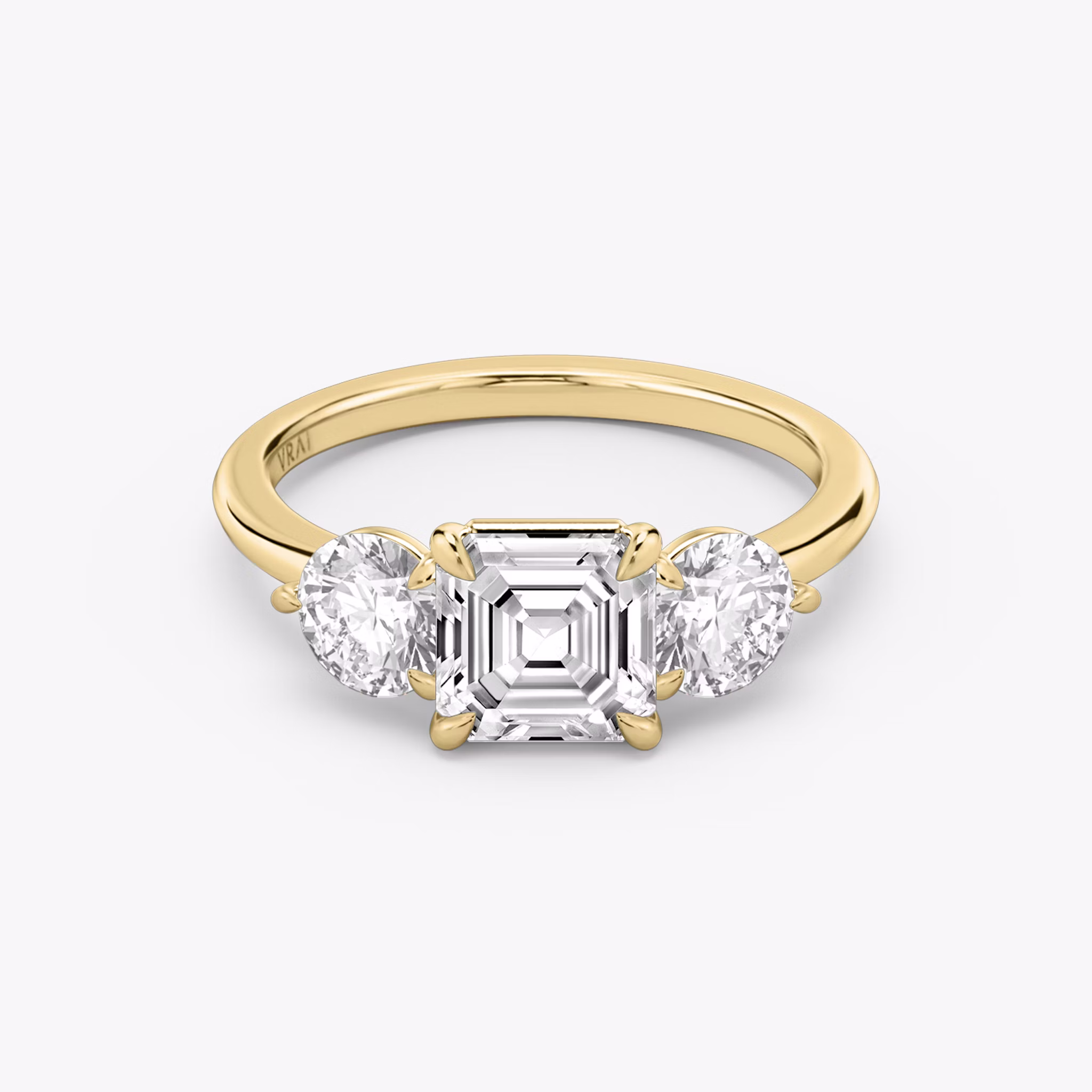 The Three Stone | Asscher | 18k | Yellow Gold | bandAccent: Plain | sideStoneCarat: 0.50ct | sideStoneShape: Round Brilliant | diamondOrientation: vertical | caratWeight: other