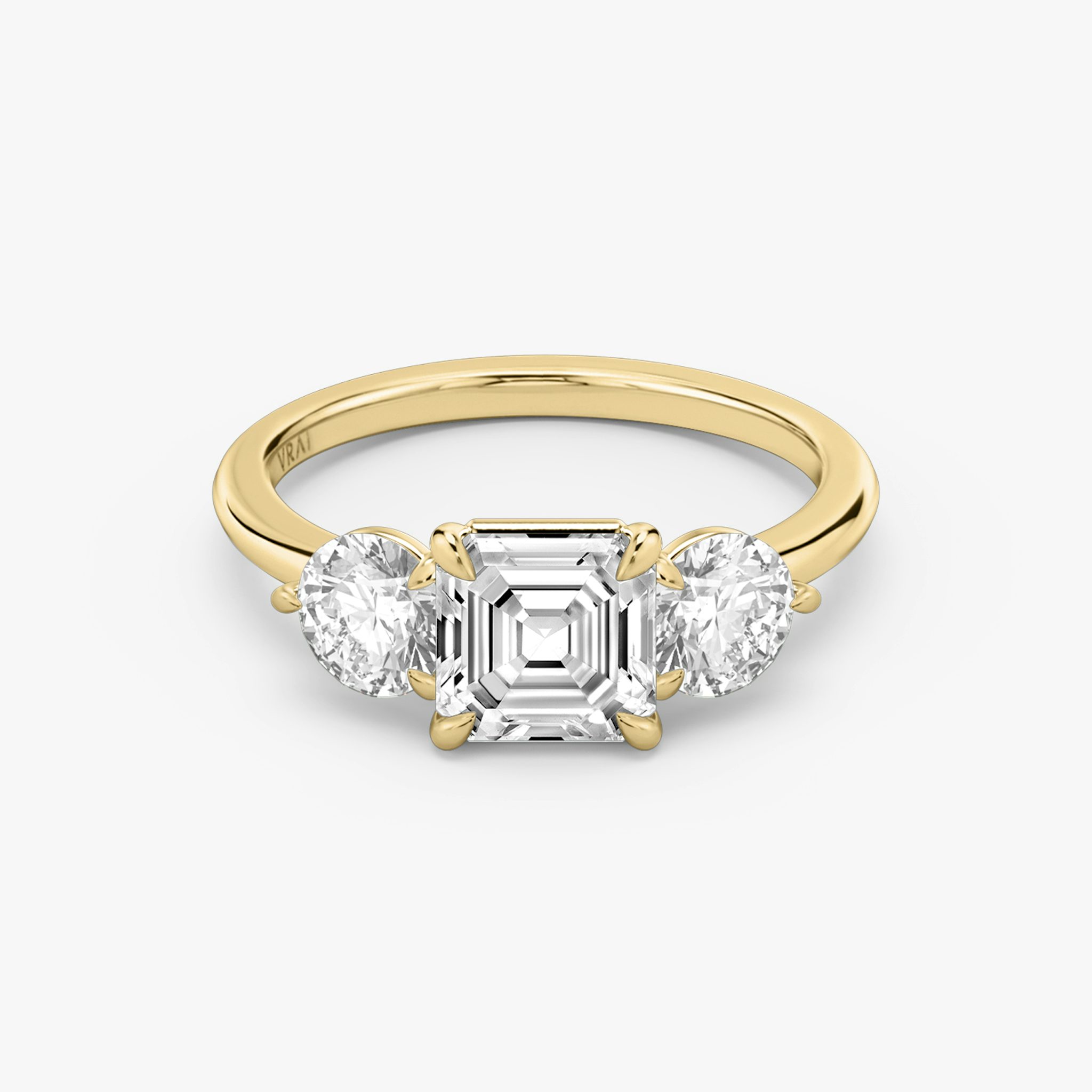 The Three Stone | Asscher | 18k | Yellow Gold | bandAccent: Plain | sideStoneCarat: 0.50ct | sideStoneShape: Round Brilliant | diamondOrientation: vertical | caratWeight: other