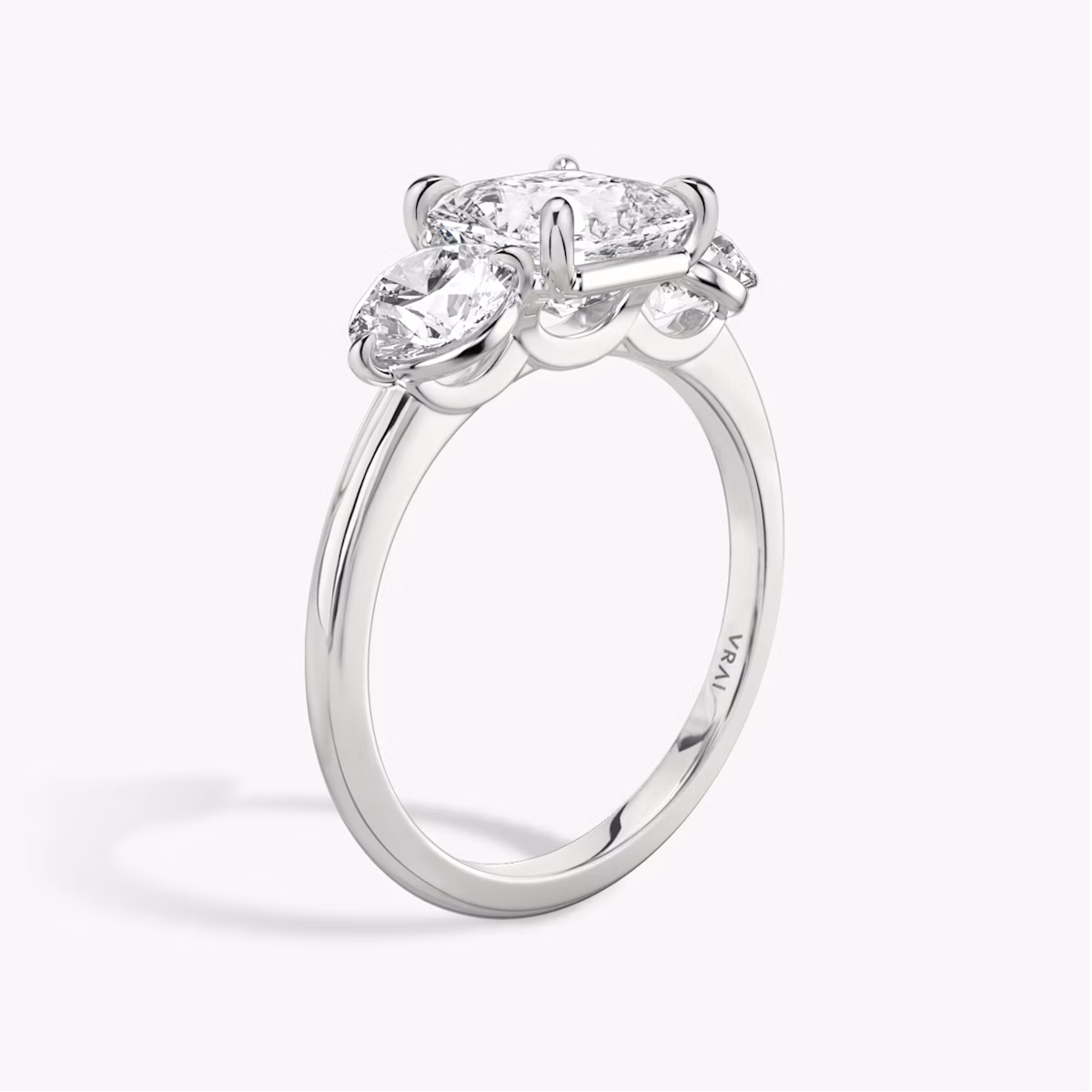 The Three Stone | Asscher | 18k | White Gold | bandAccent: Plain | sideStoneCarat: 0.50ct | sideStoneShape: Round Brilliant | diamondOrientation: vertical | caratWeight: other