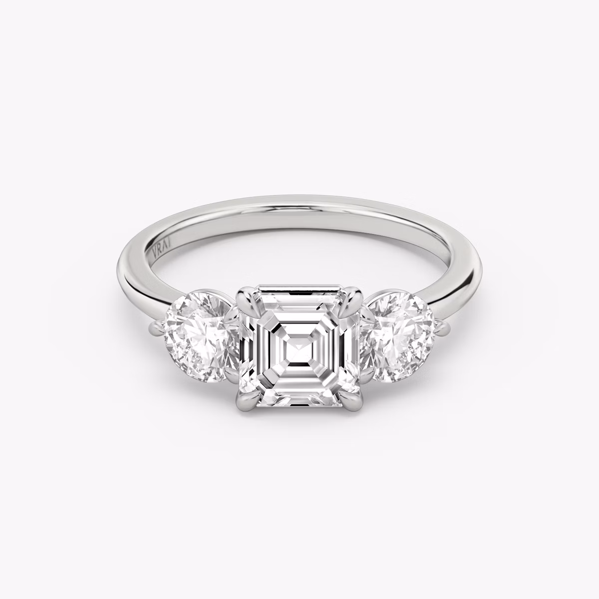 The Three Stone | Asscher | Platinum | bandAccent: Plain | sideStoneCarat: 0.50ct | sideStoneShape: Round Brilliant | diamondOrientation: vertical | caratWeight: other