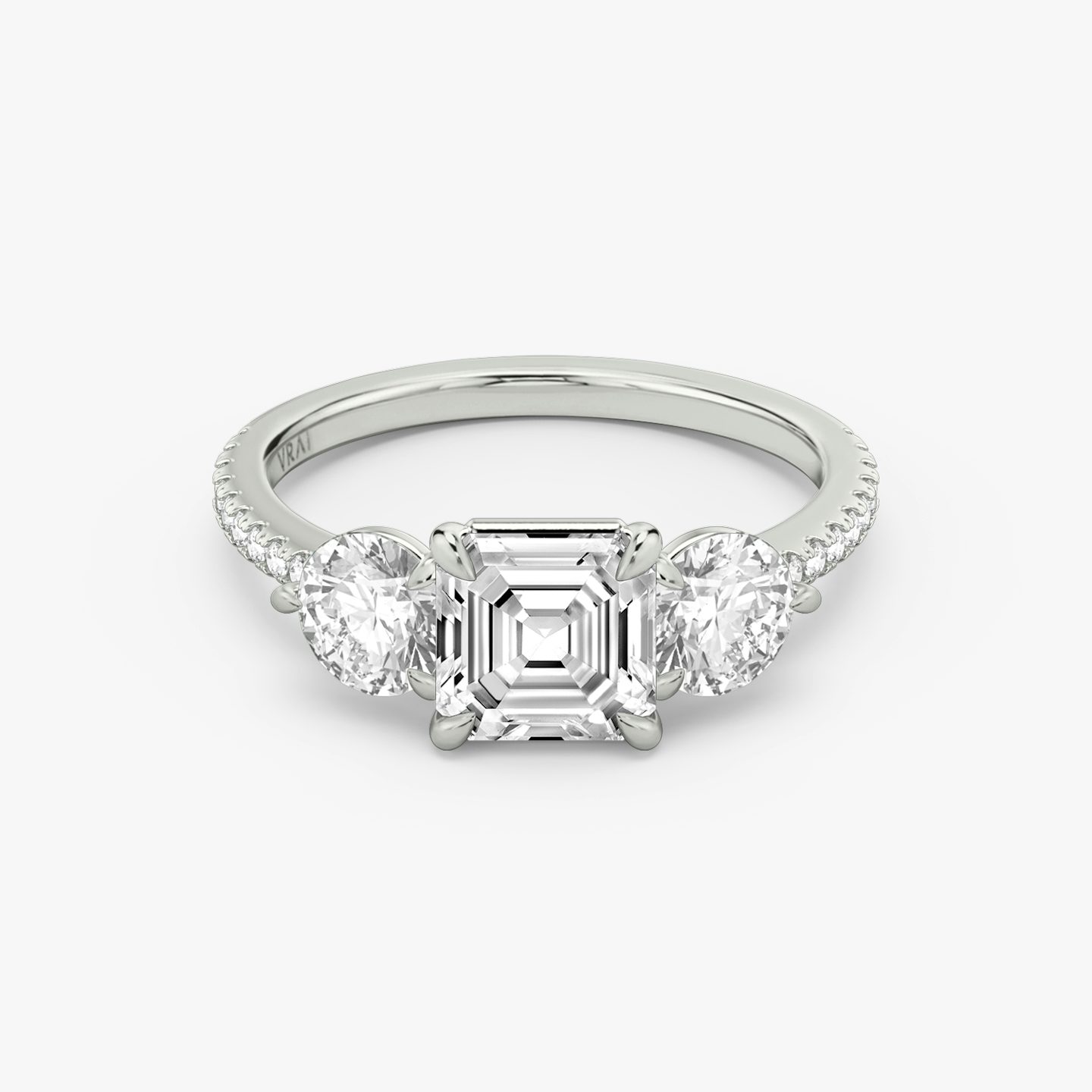 The Three Stone | Asscher | 18k | White Gold | bandAccent: Pavé | sideStoneCarat: 0.50ct | sideStoneShape: Round Brilliant | diamondOrientation: vertical | caratWeight: other