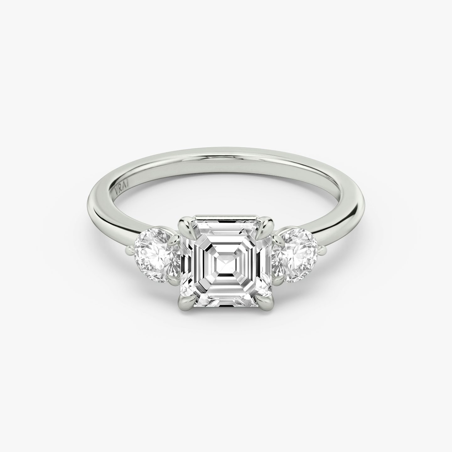 The Three Stone | Asscher | Platinum | bandAccent: Plain | sideStoneCarat: 0.25ct | sideStoneShape: Round Brilliant | diamondOrientation: vertical | caratWeight: other