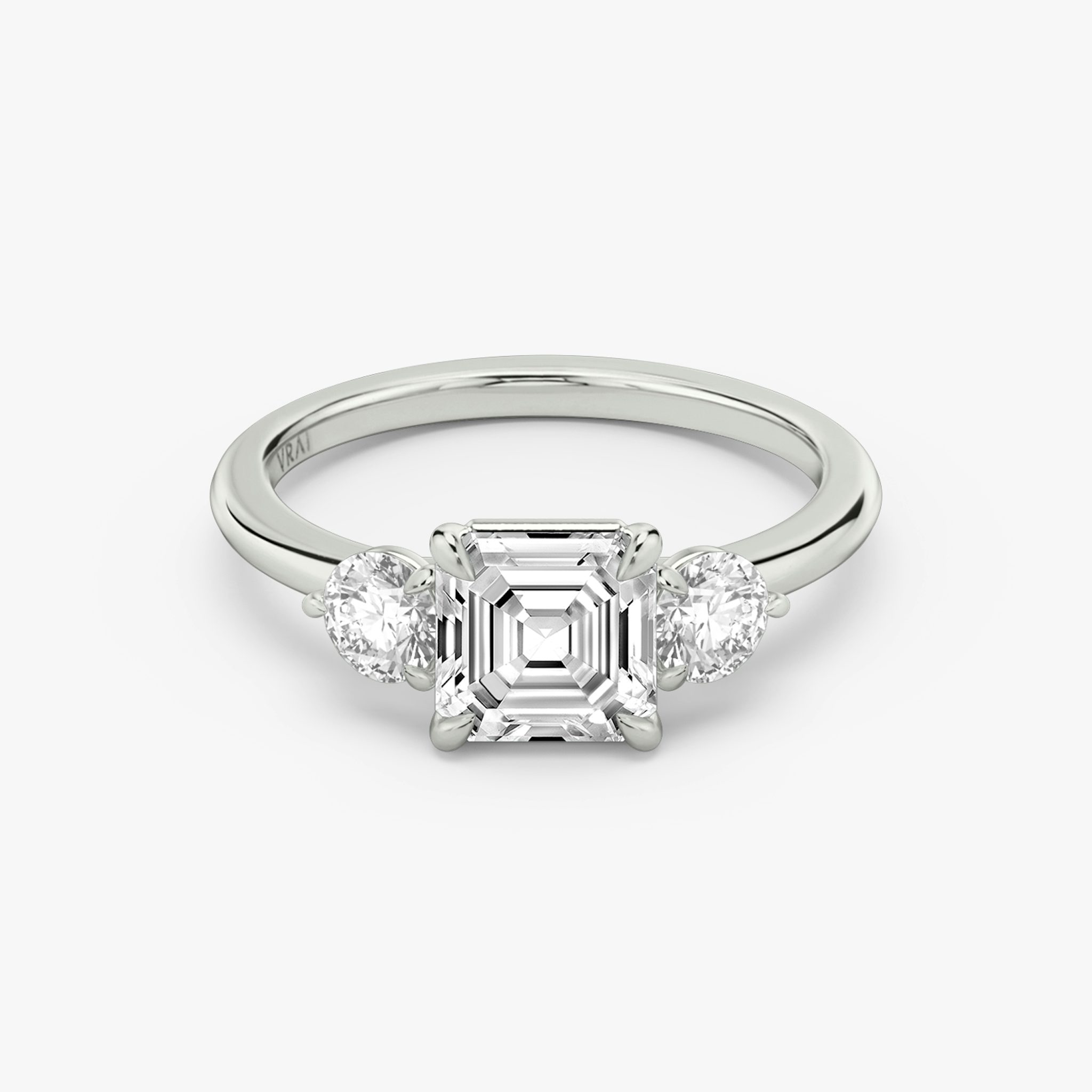 The Three Stone | Asscher | Platinum | bandAccent: Plain | sideStoneCarat: 0.25ct | sideStoneShape: Round Brilliant | diamondOrientation: vertical | caratWeight: other