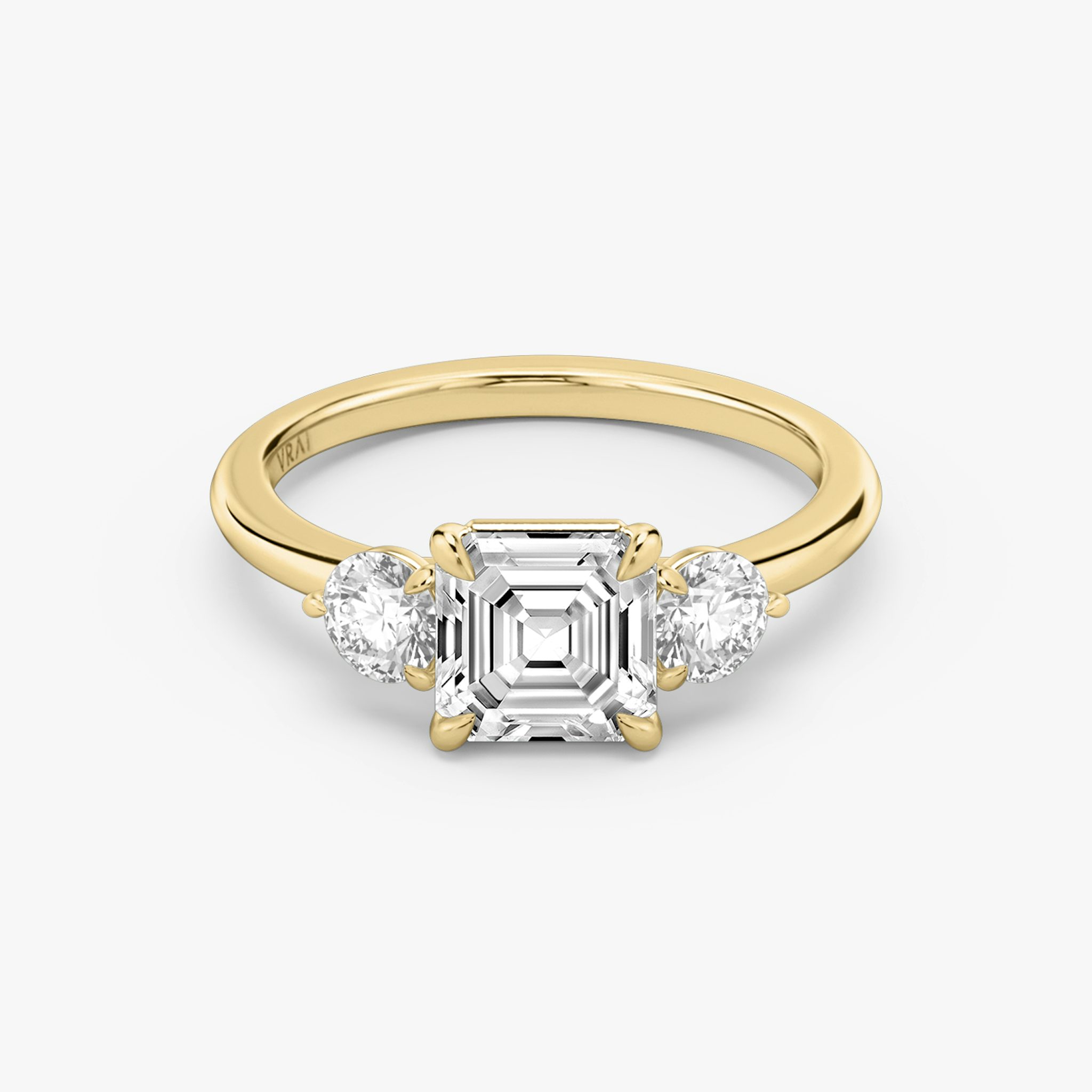 The Three Stone | Asscher | 18k | Yellow Gold | bandAccent: Plain | sideStoneCarat: 0.25ct | sideStoneShape: Round Brilliant | diamondOrientation: vertical | caratWeight: other