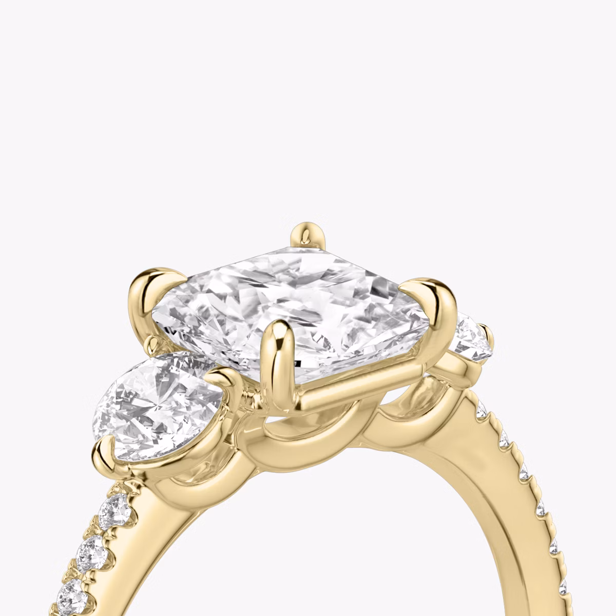 The Three Stone | Asscher | 18k | Yellow Gold | bandAccent: Pavé | sideStoneCarat: 0.25ct | sideStoneShape: Round Brilliant | diamondOrientation: vertical | caratWeight: other